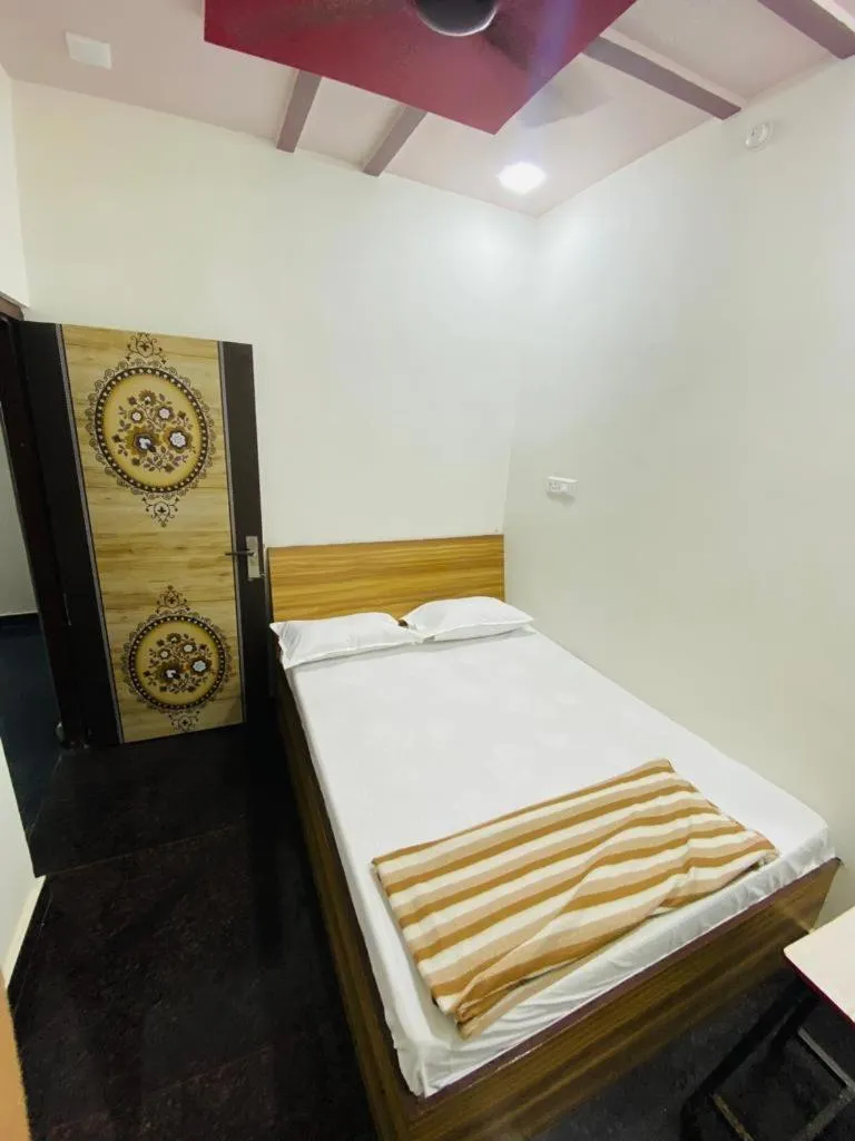 Bed in Hotel Arsh Palace