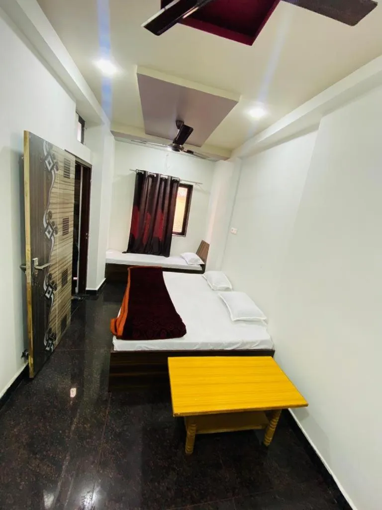 Bed in Hotel Arsh Palace