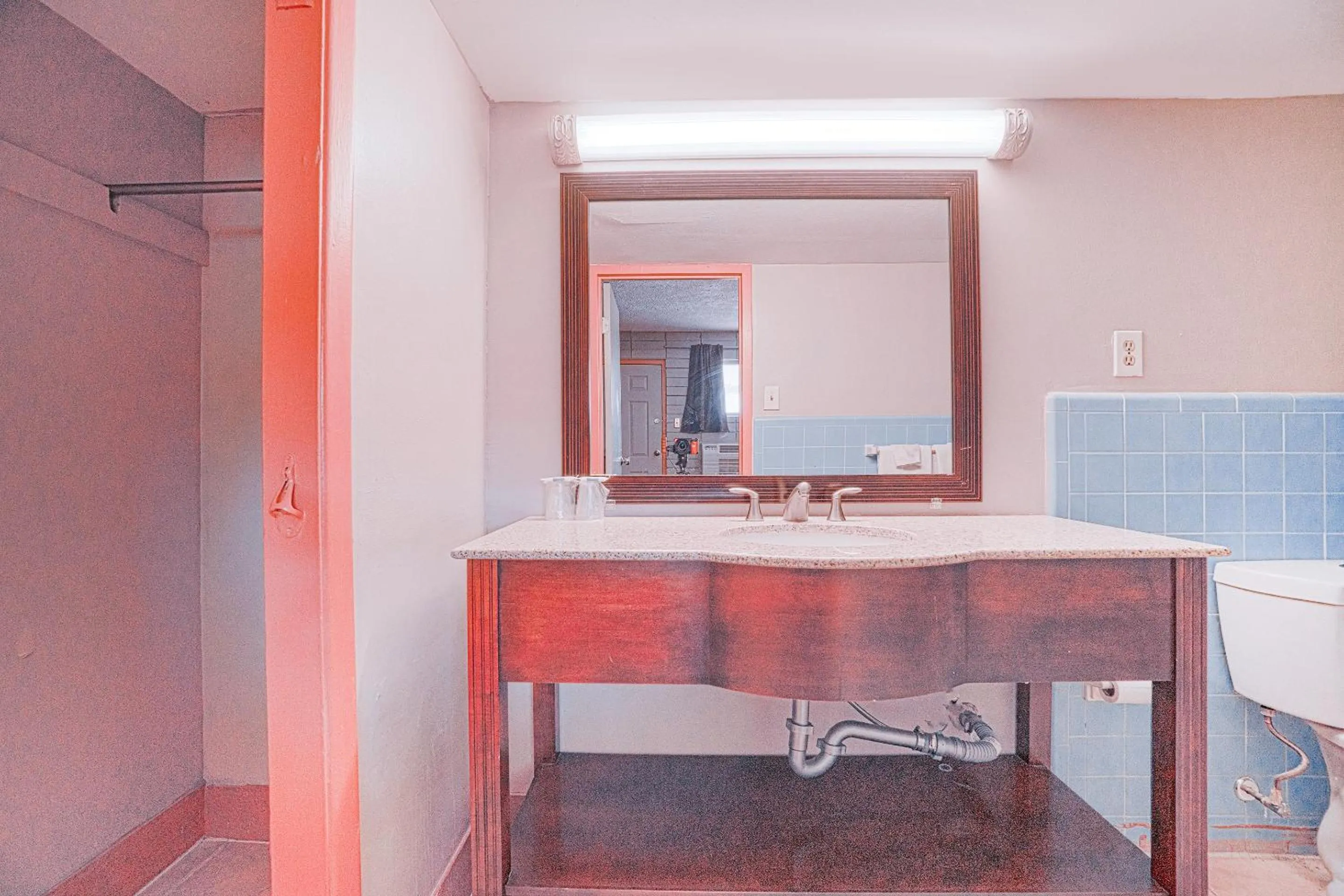 Bathroom in Town & Country Motel Bossier City by OYO