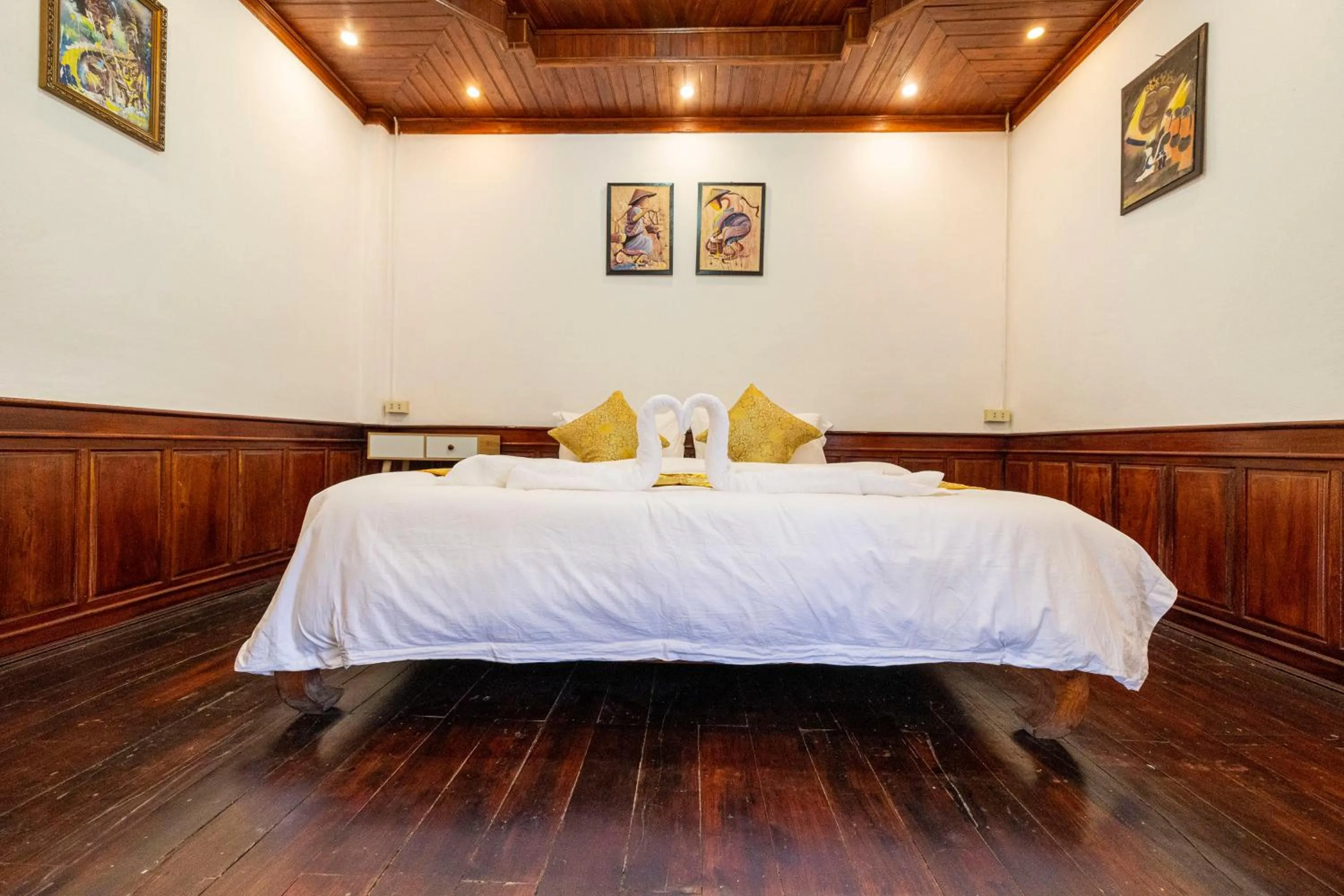 Bed in Mekong Chidlatda Villa