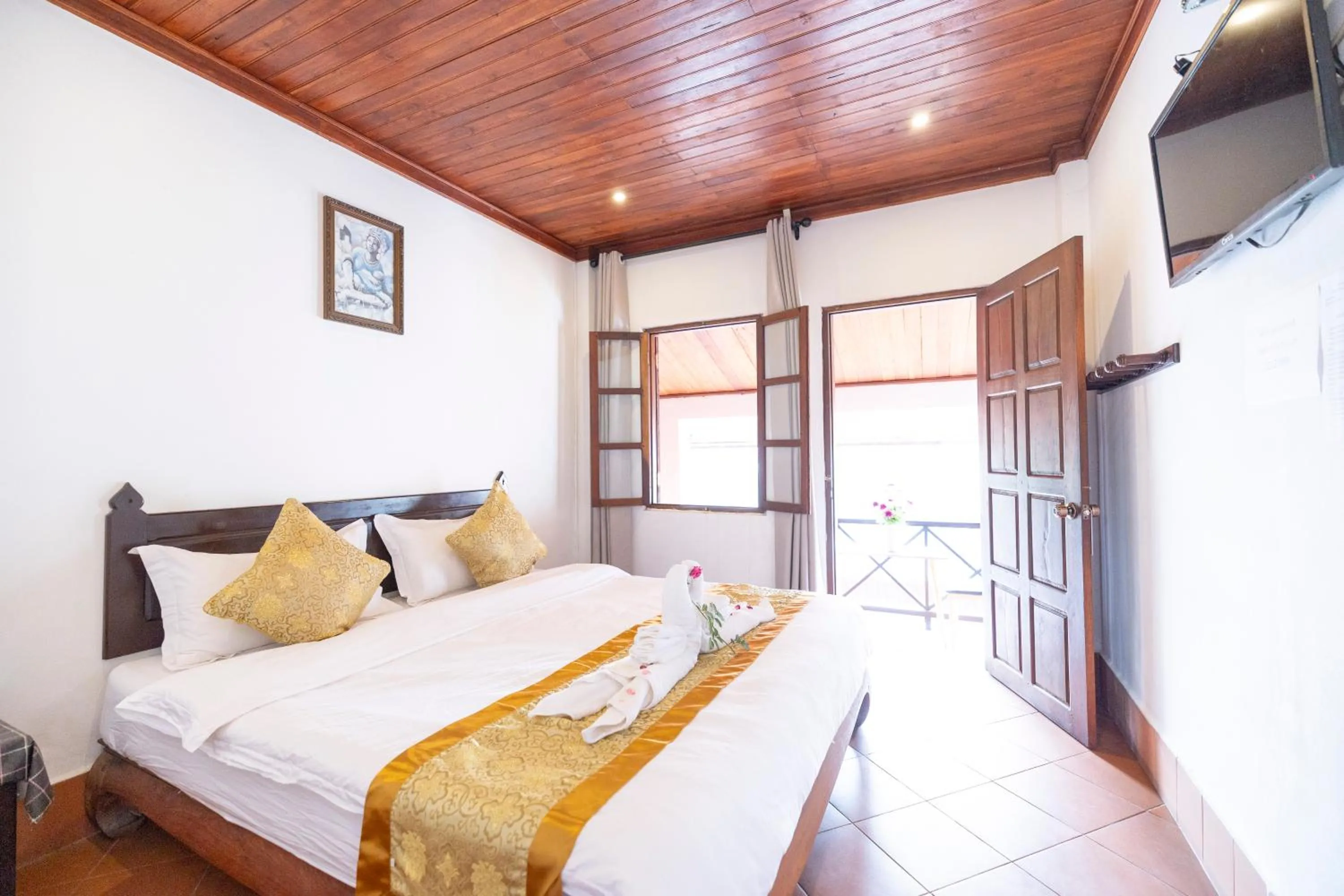 Bed in Mekong Chidlatda Villa