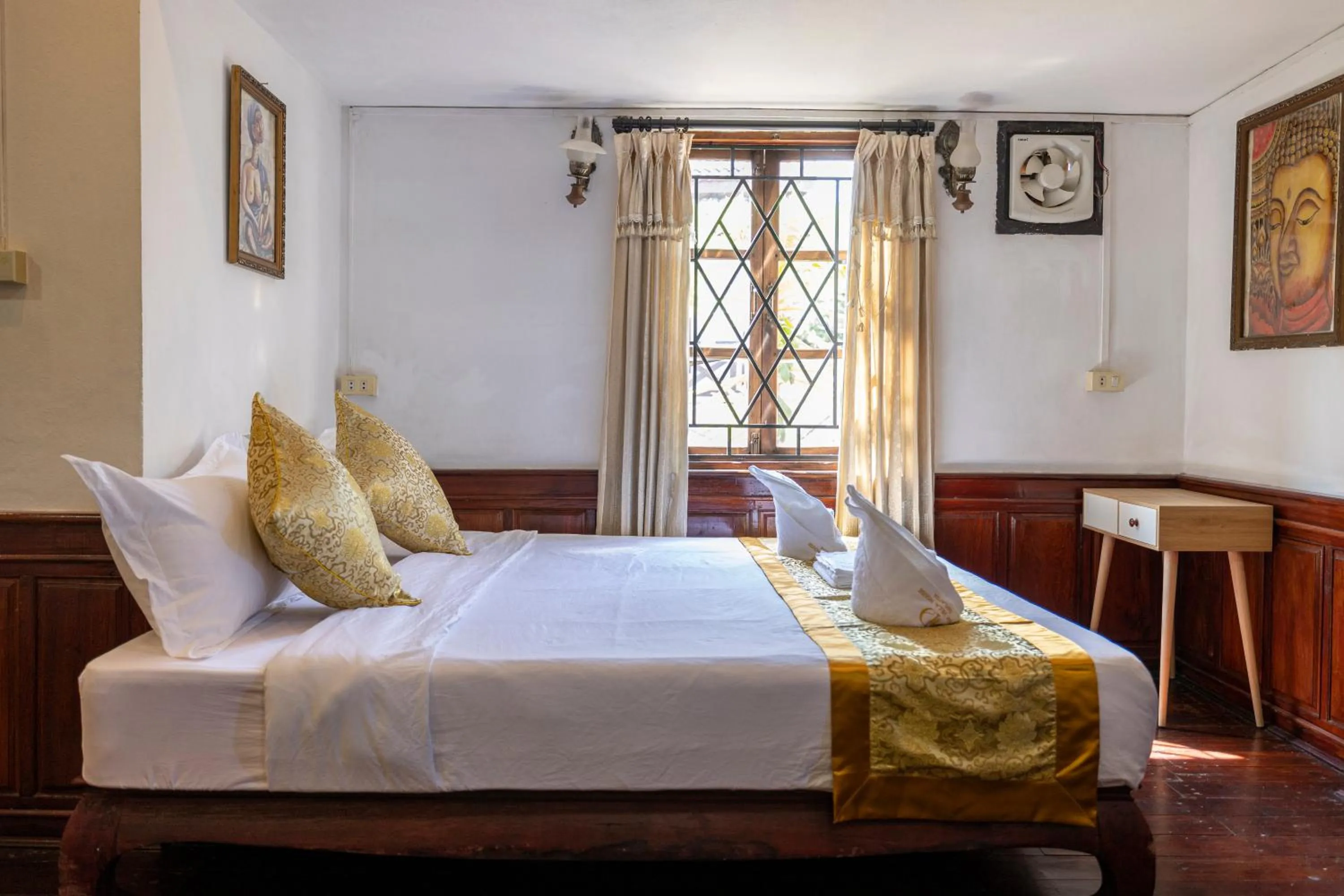 Bed in Mekong Chidlatda Villa