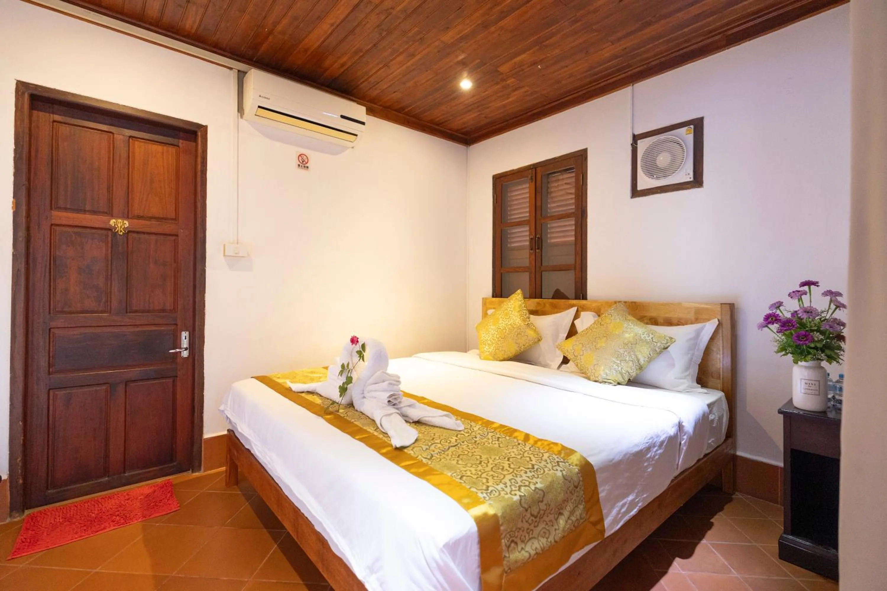 Bed in Mekong Chidlatda Villa