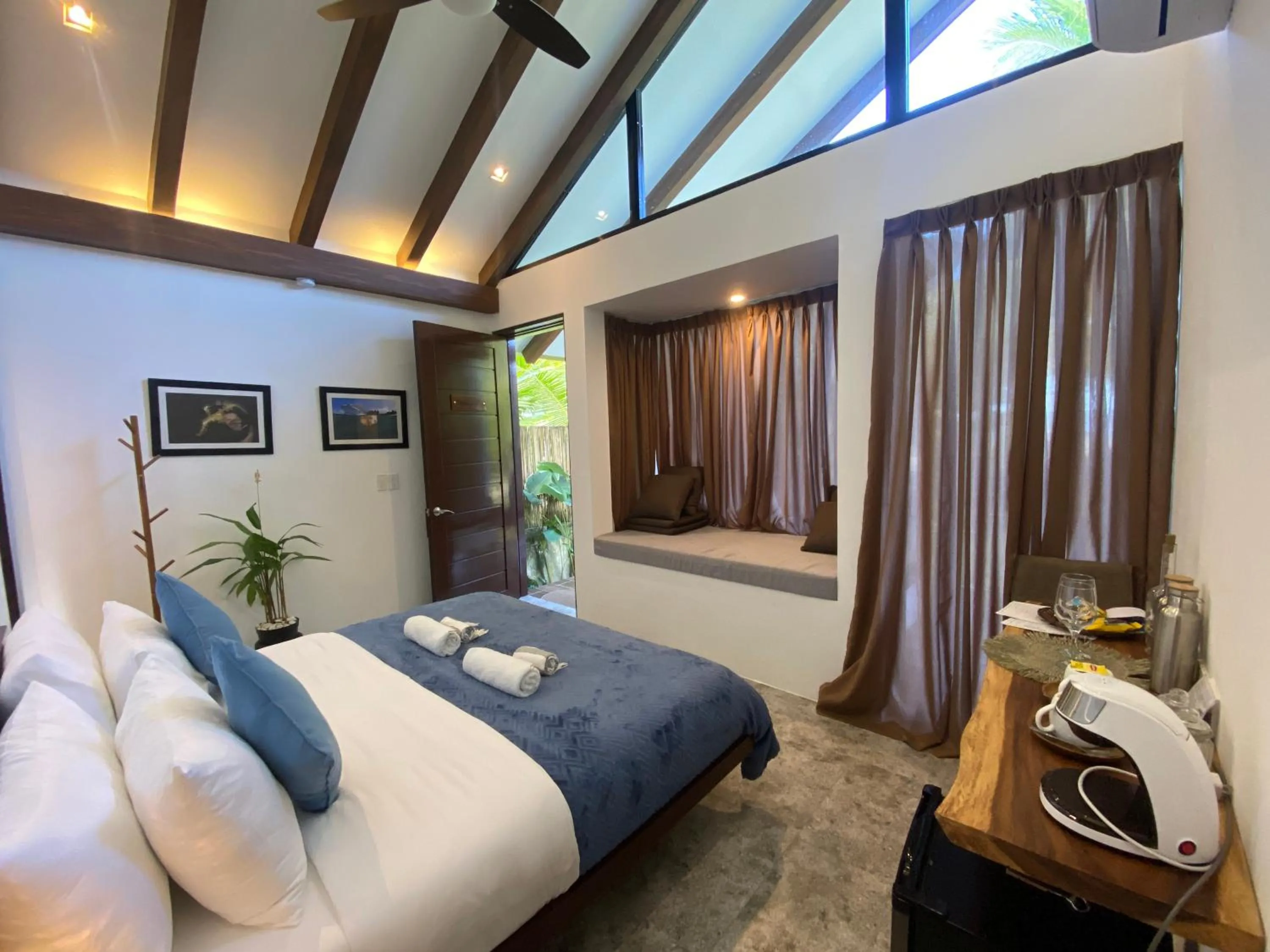 Bed in Amila Dive Beach Resort