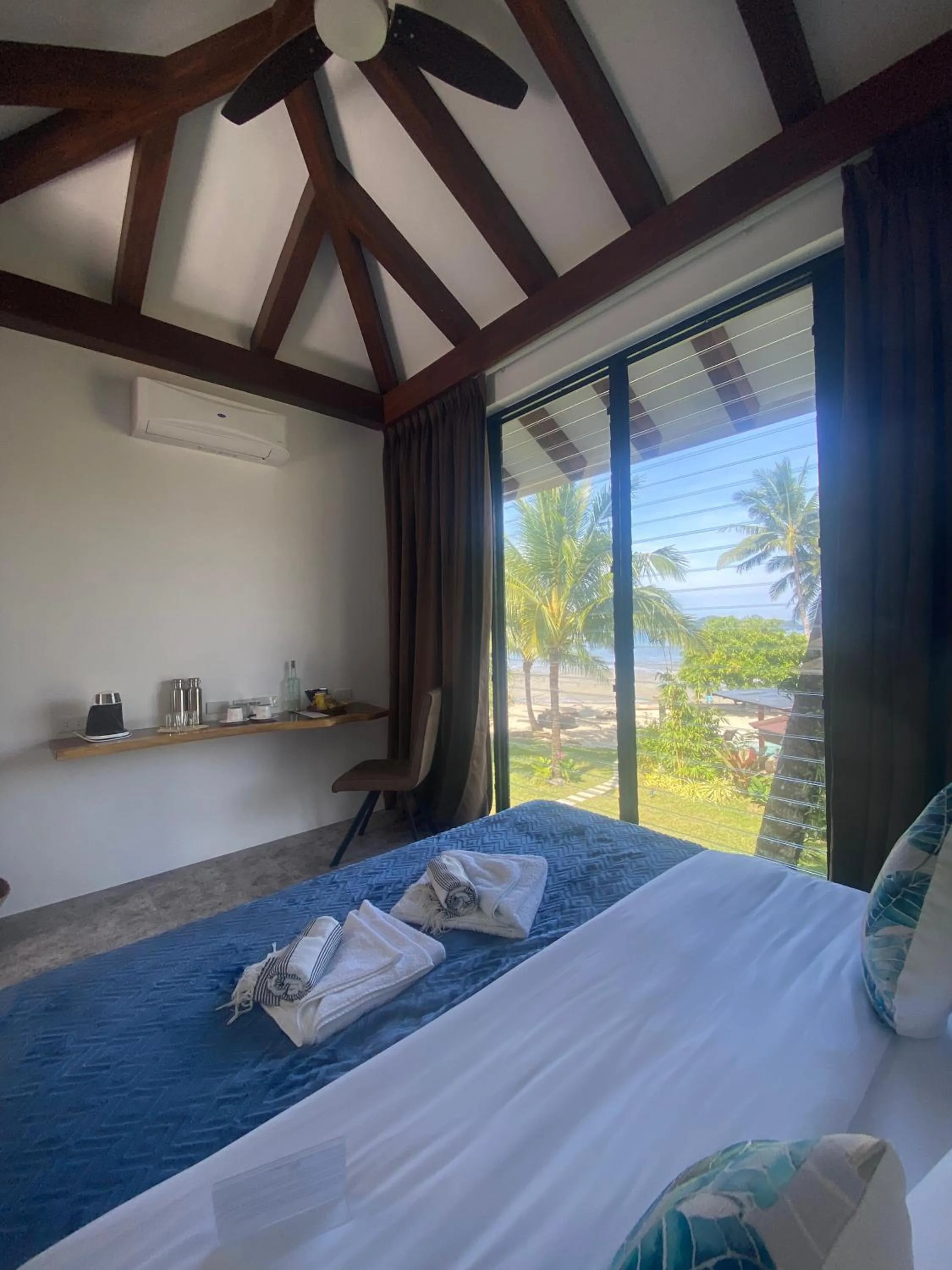 Bed in Amila Dive Beach Resort