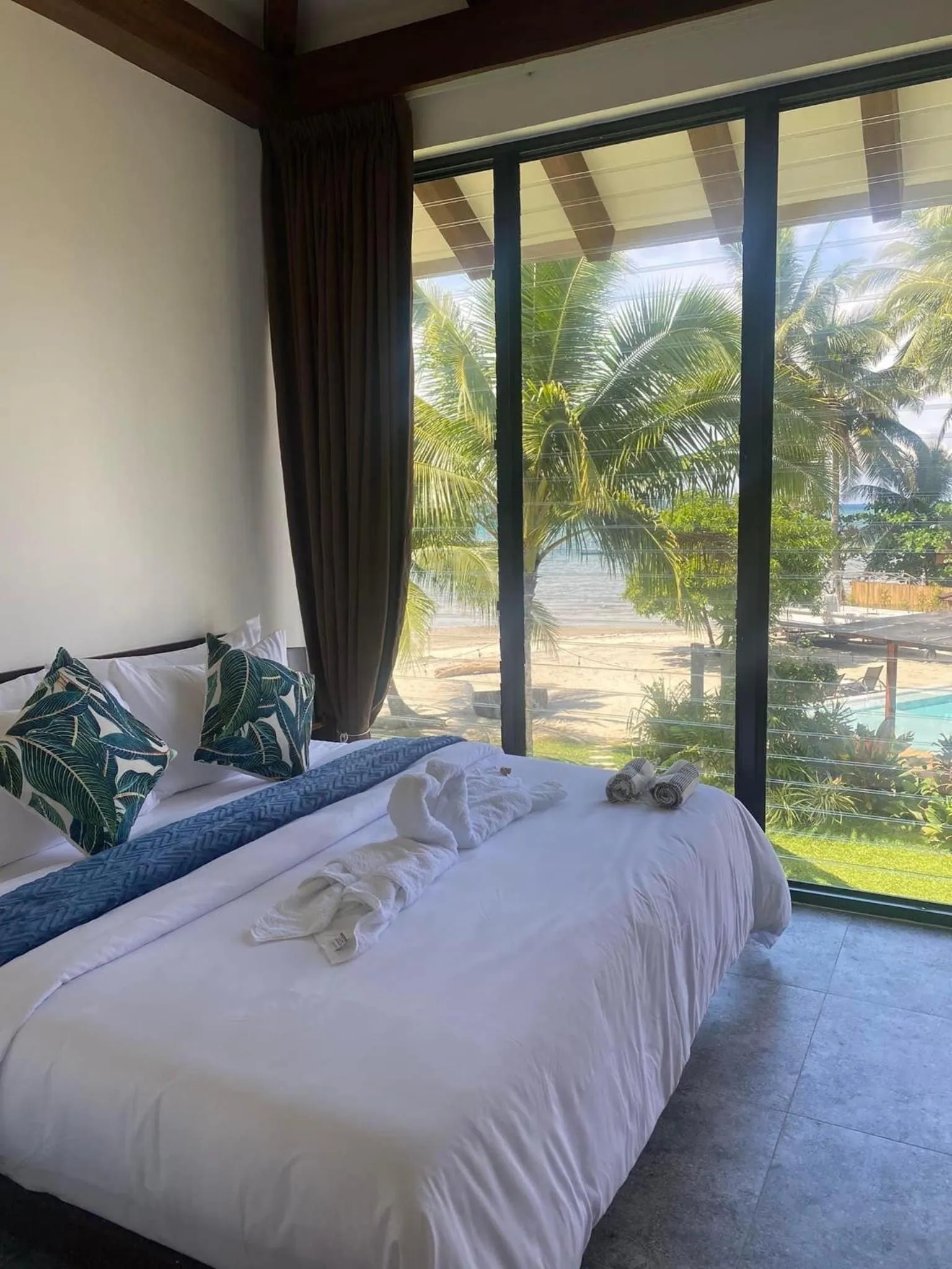 Bed in Amila Dive Beach Resort