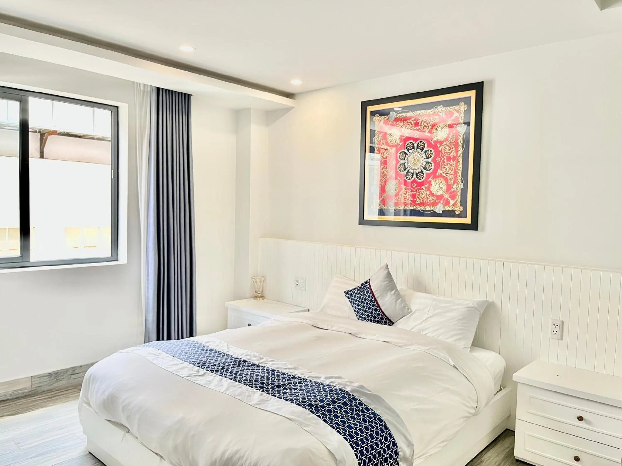 Living room, Bed in BALLANTINE HOTEL Phu My Hung- SECC