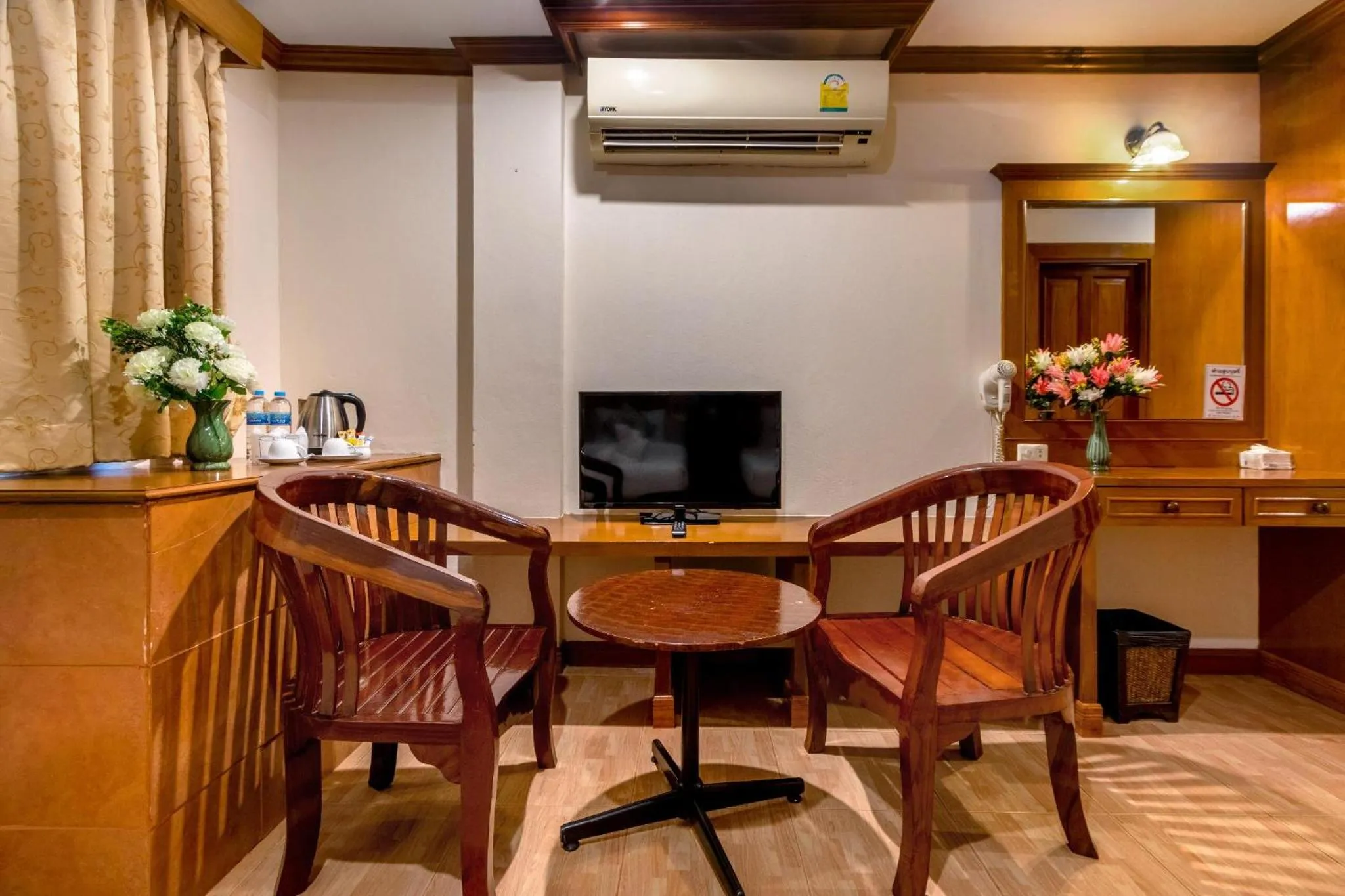 Seating area in JB Green Hotel Patong