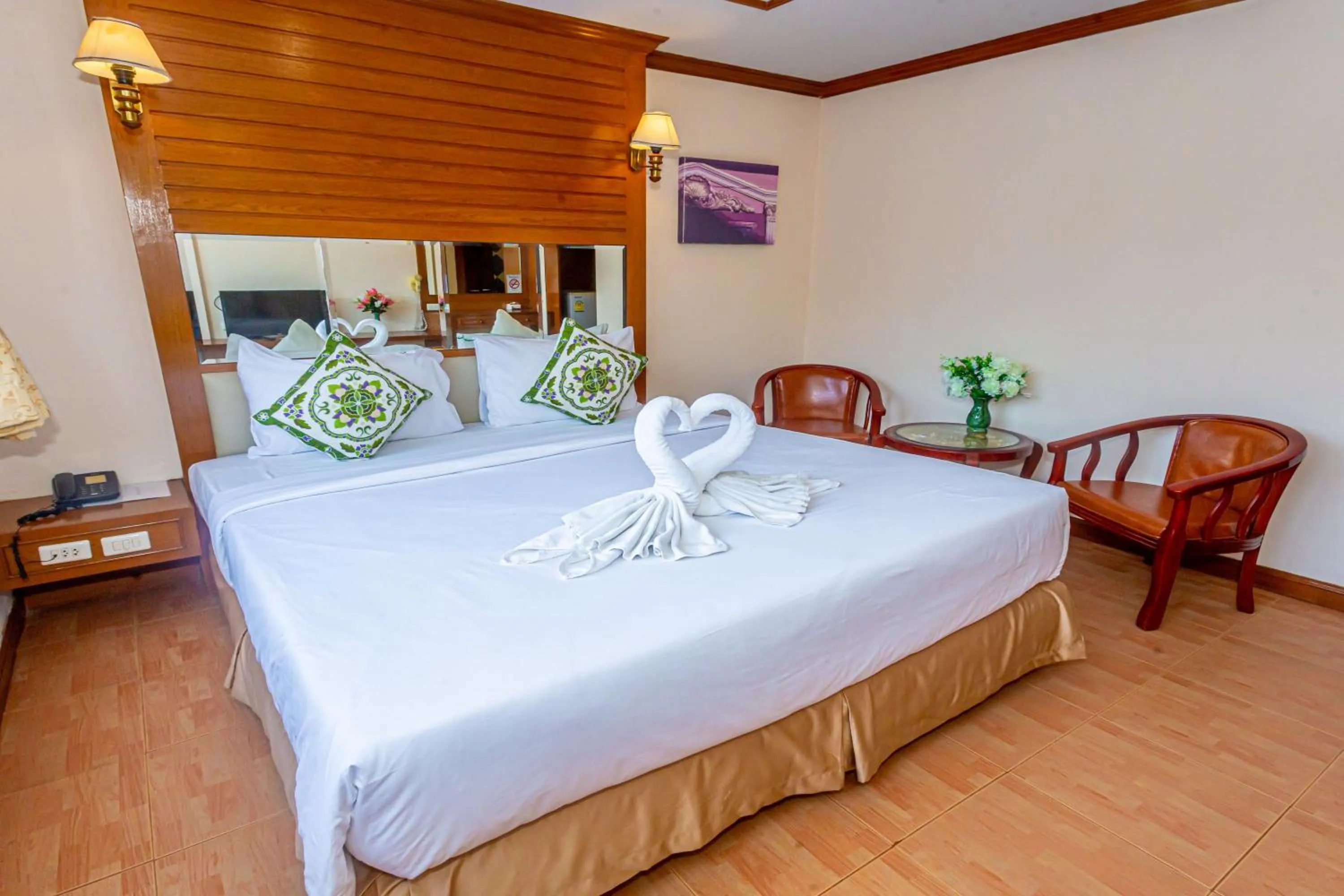 Seating area, Bed in JB Green Hotel Patong