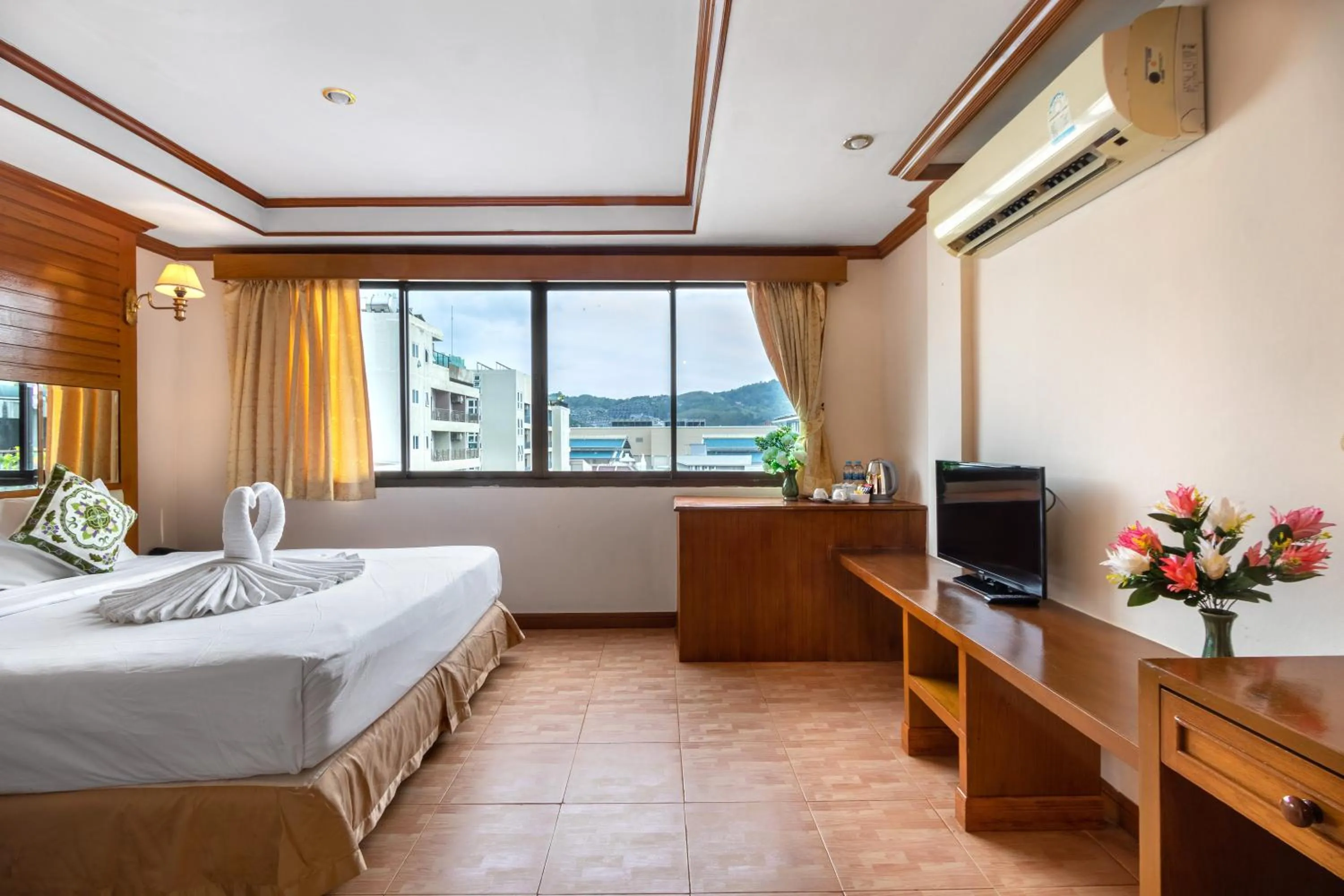 View (from property/room), Bed in JB Green Hotel Patong