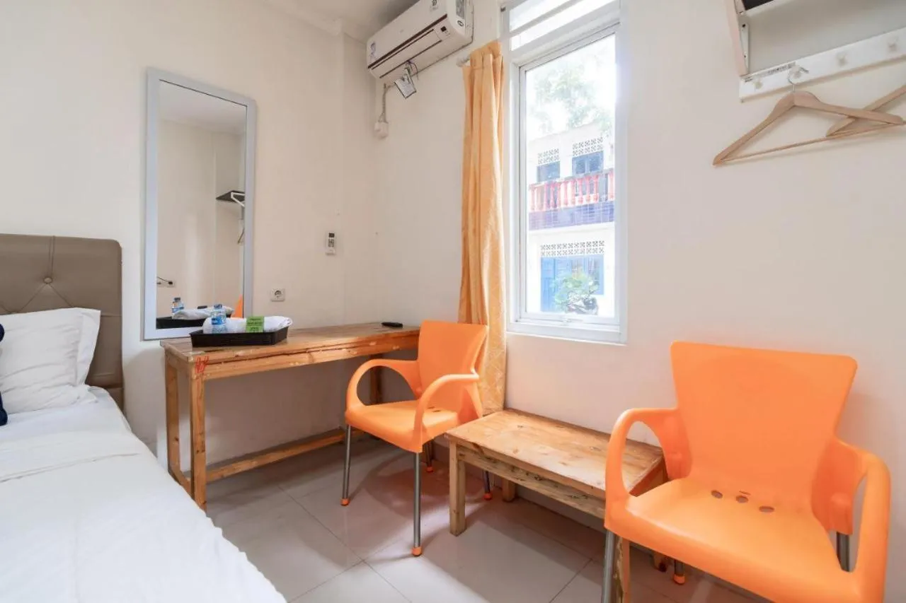 Living room, Bed in Wisma Minongga By SPAZIE