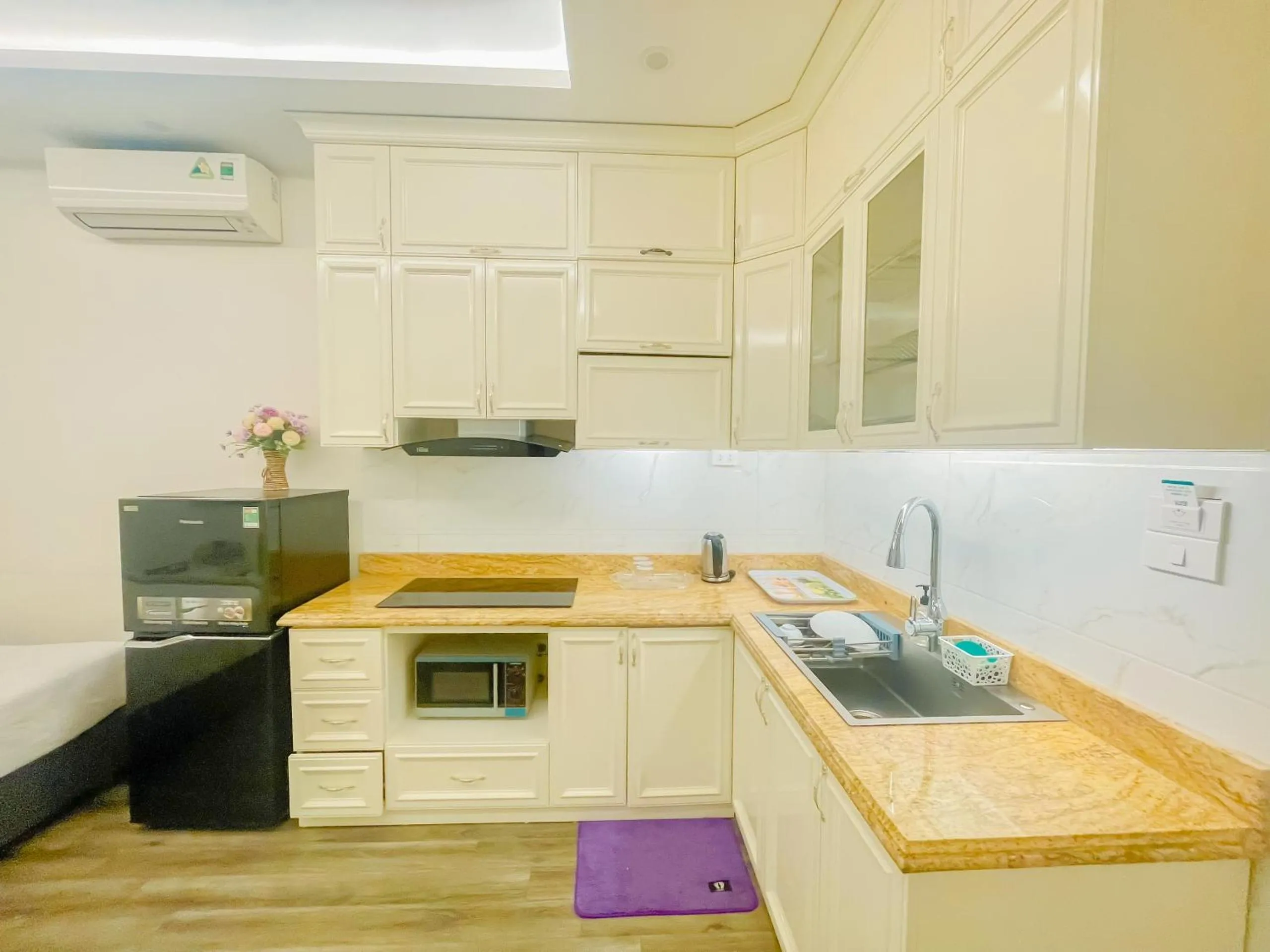 stove in Rosee Apartment Hotel