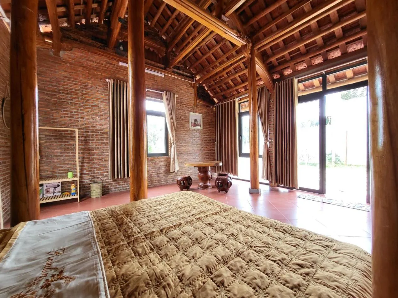 Bed in T'Farmstay villa and resort Buon Ma Thuot City