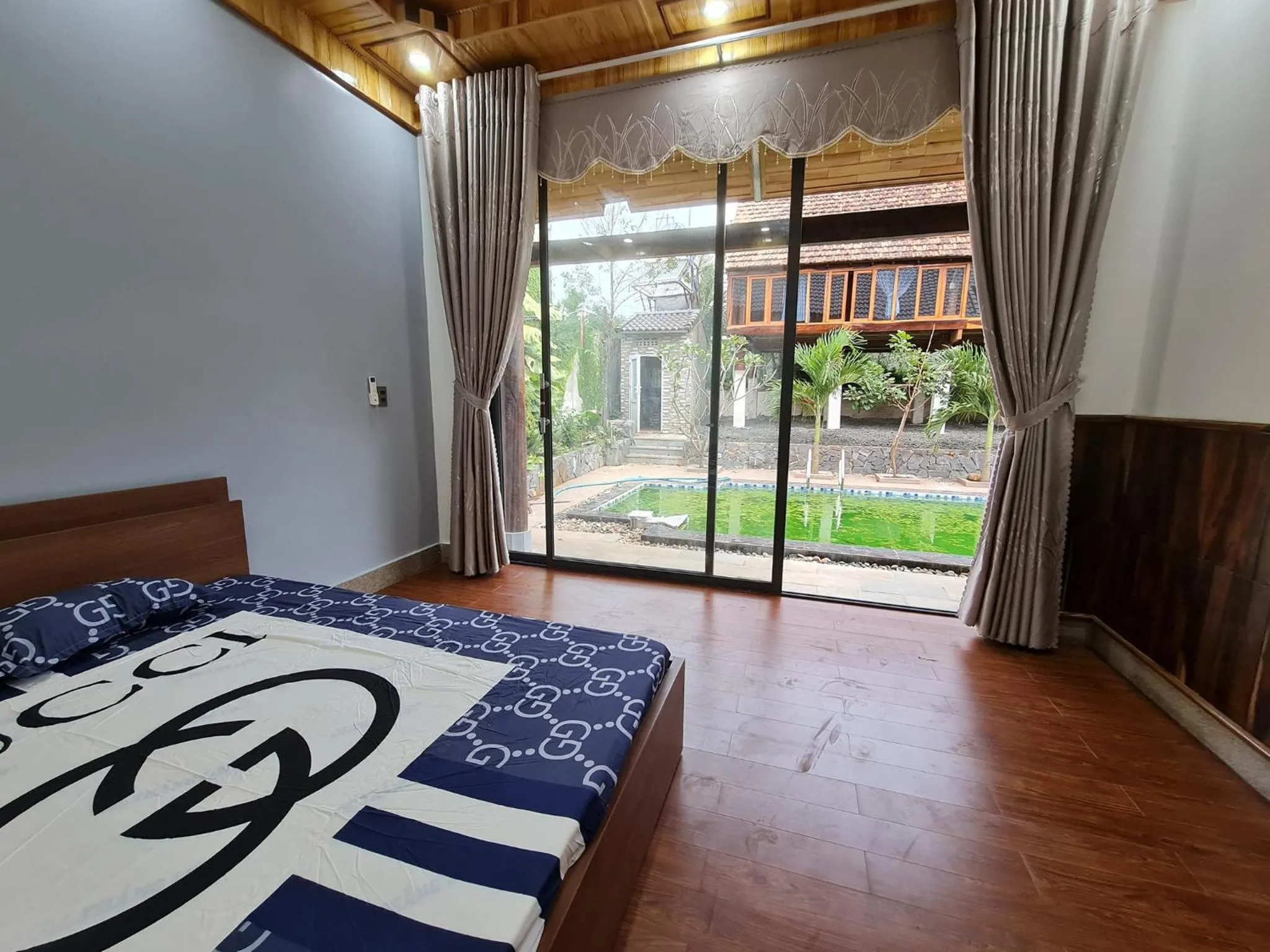 Bedroom, Bed in T'Farmstay villa and resort Buon Ma Thuot City