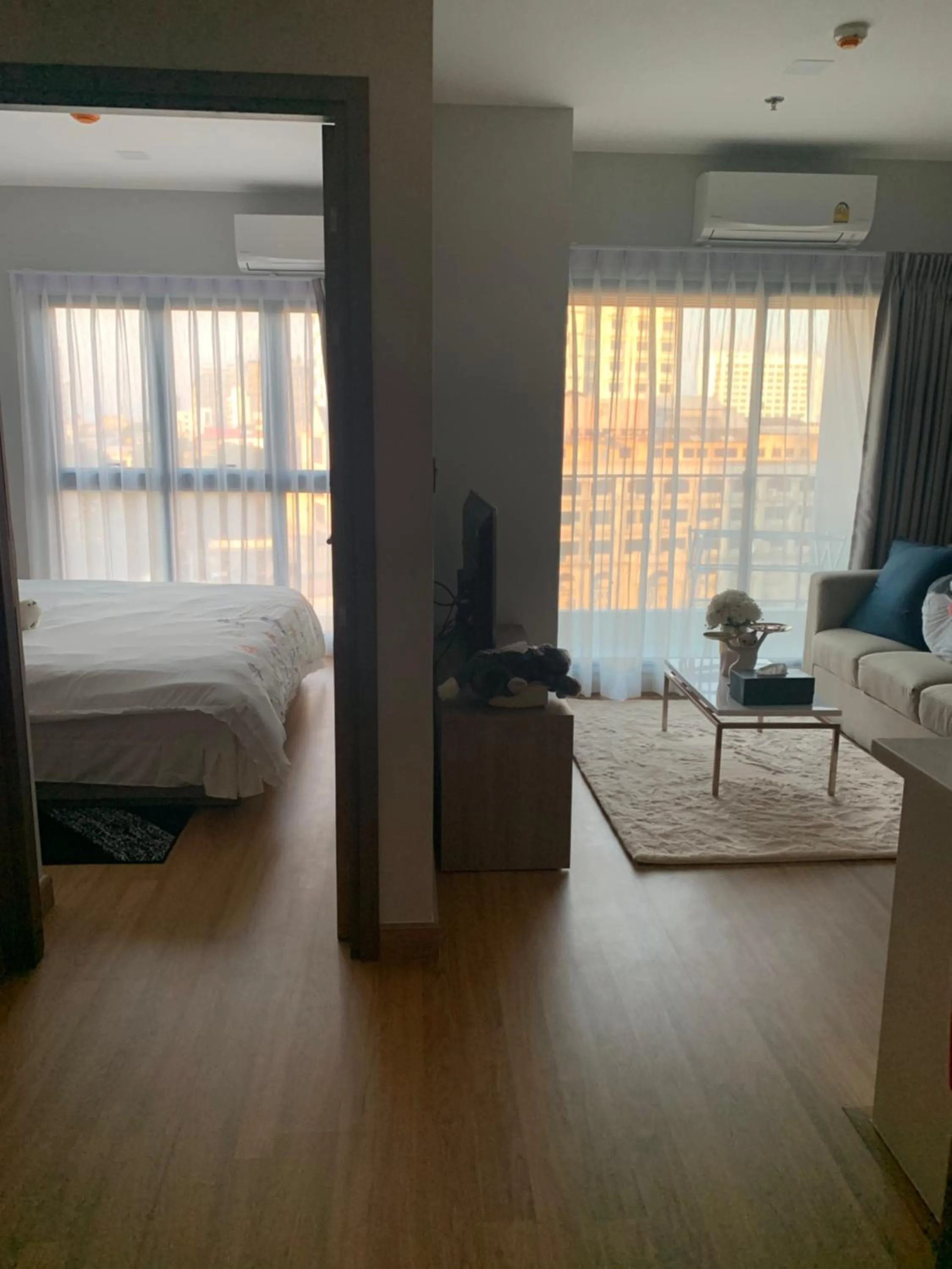 Bed in Astra Sky River Condo