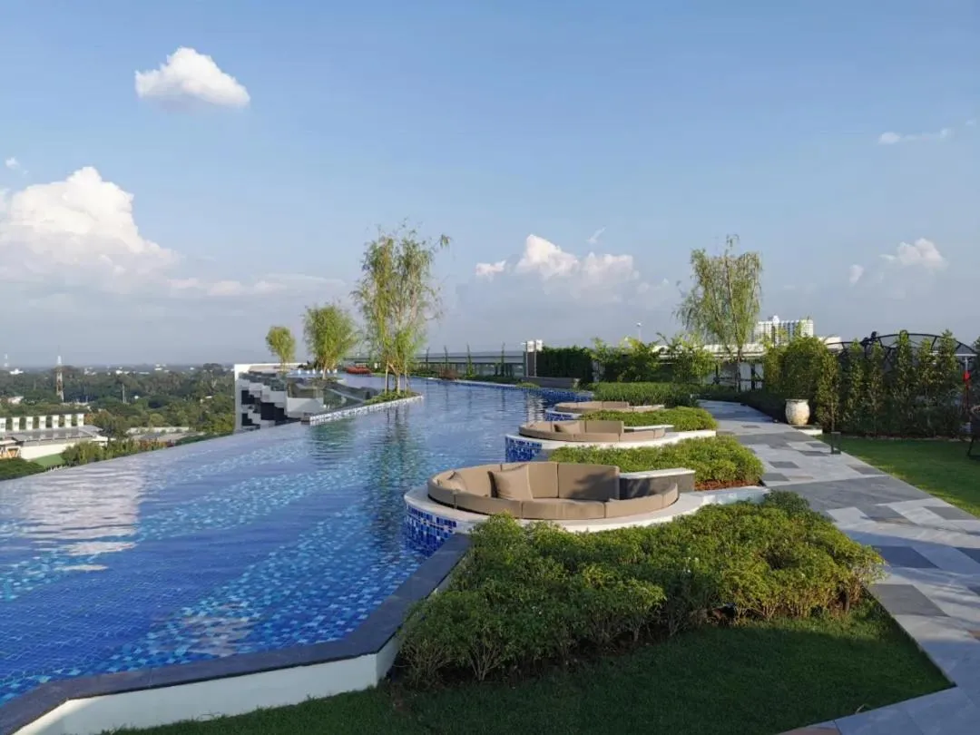 Swimming pool in Astra Sky River Condo