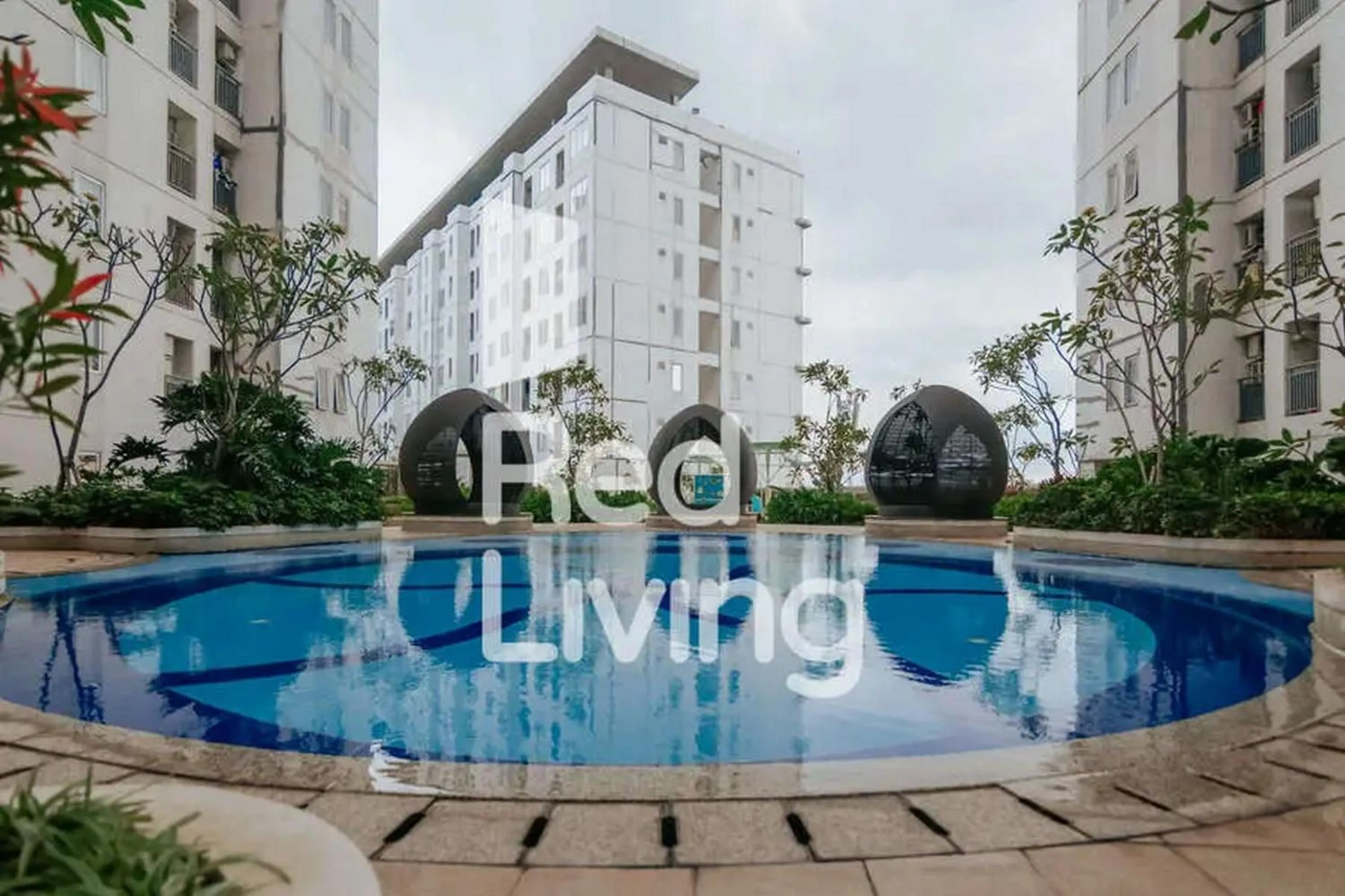 Swimming pool in RedLiving Apartemen Bassura City - Vina Tan Tower Flamboyan