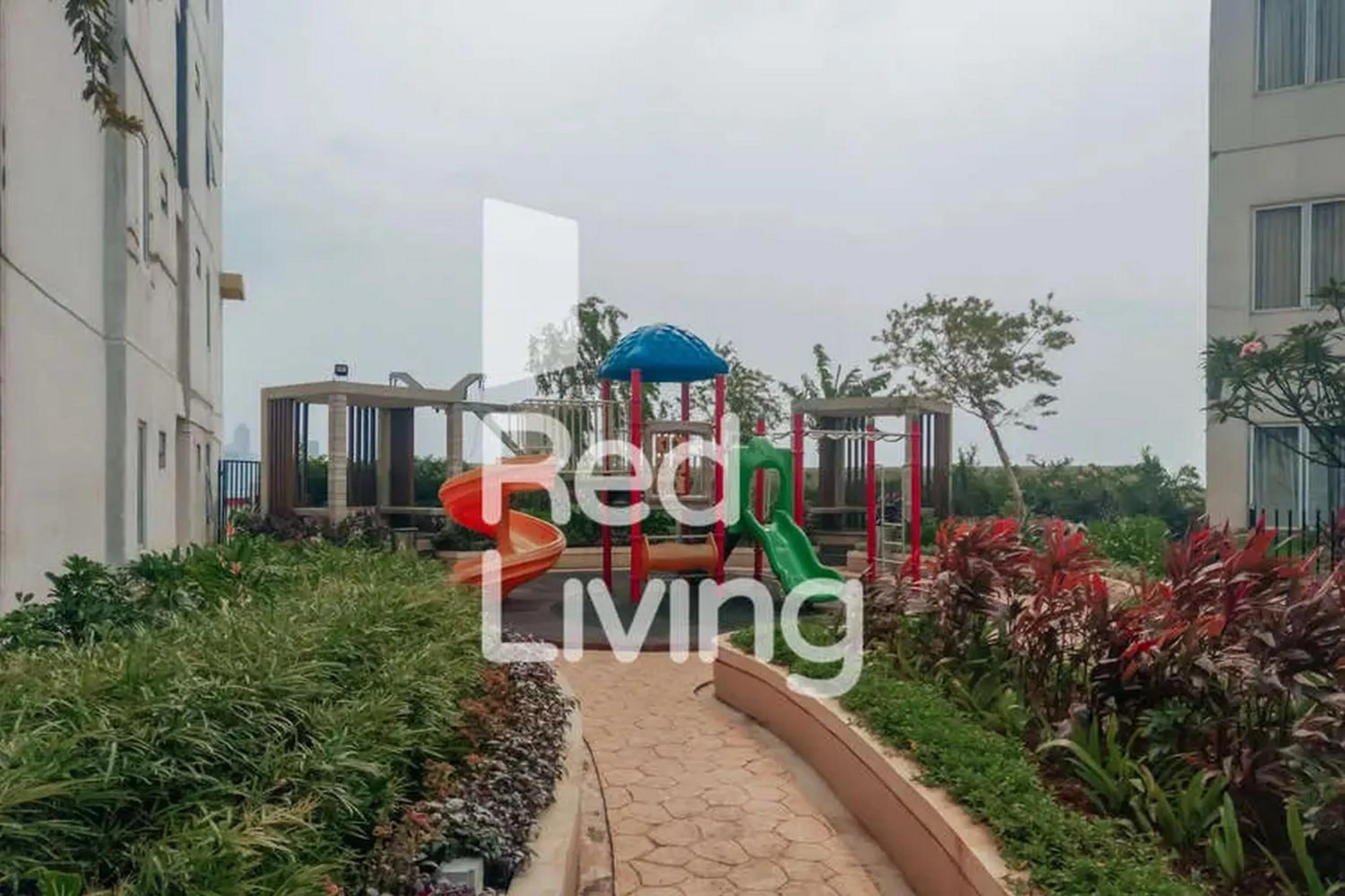 Garden in RedLiving Apartemen Bassura City - Vina Tan Tower Flamboyan