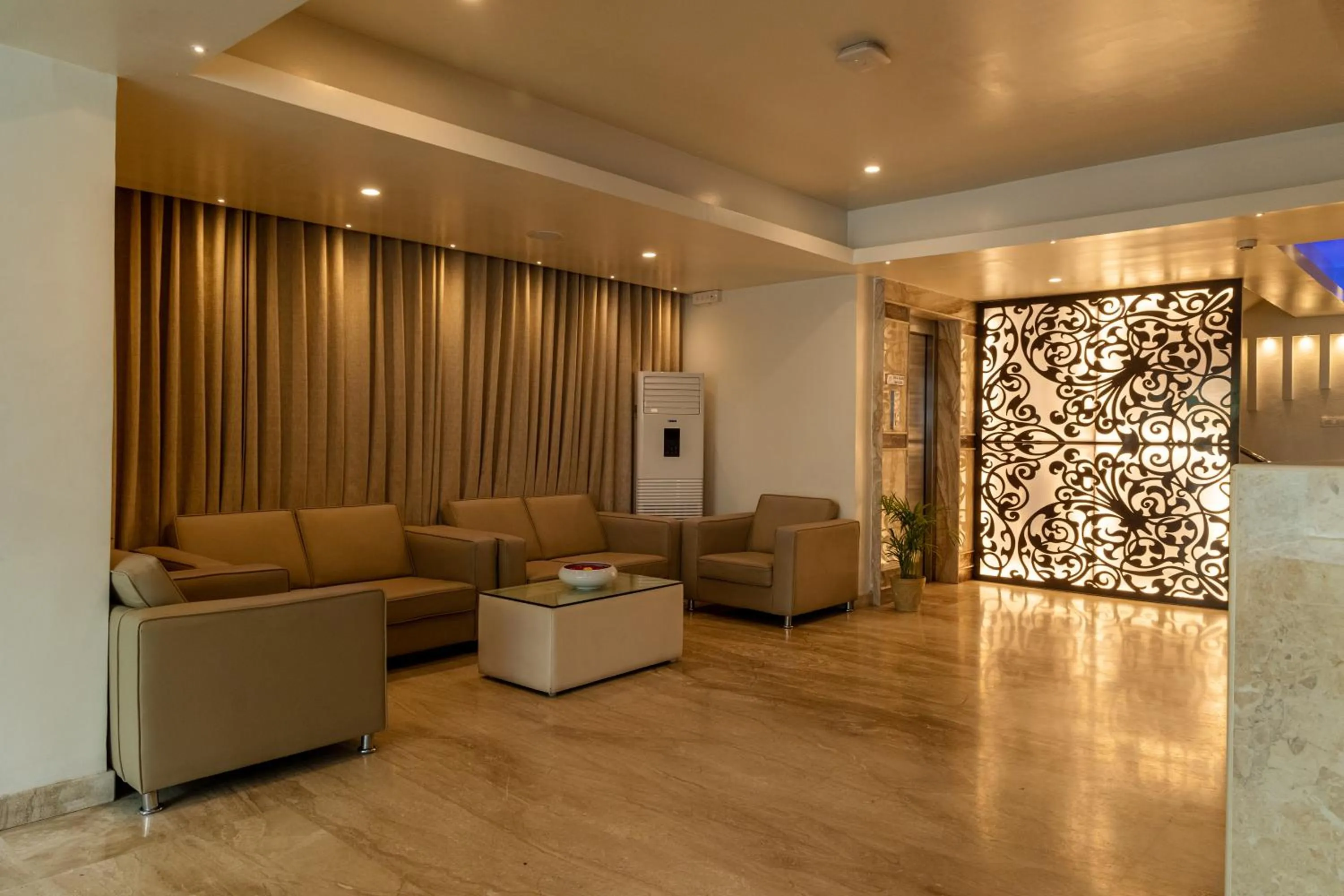Seating area in Tetrad Hotels - International Airport Road Hebbal