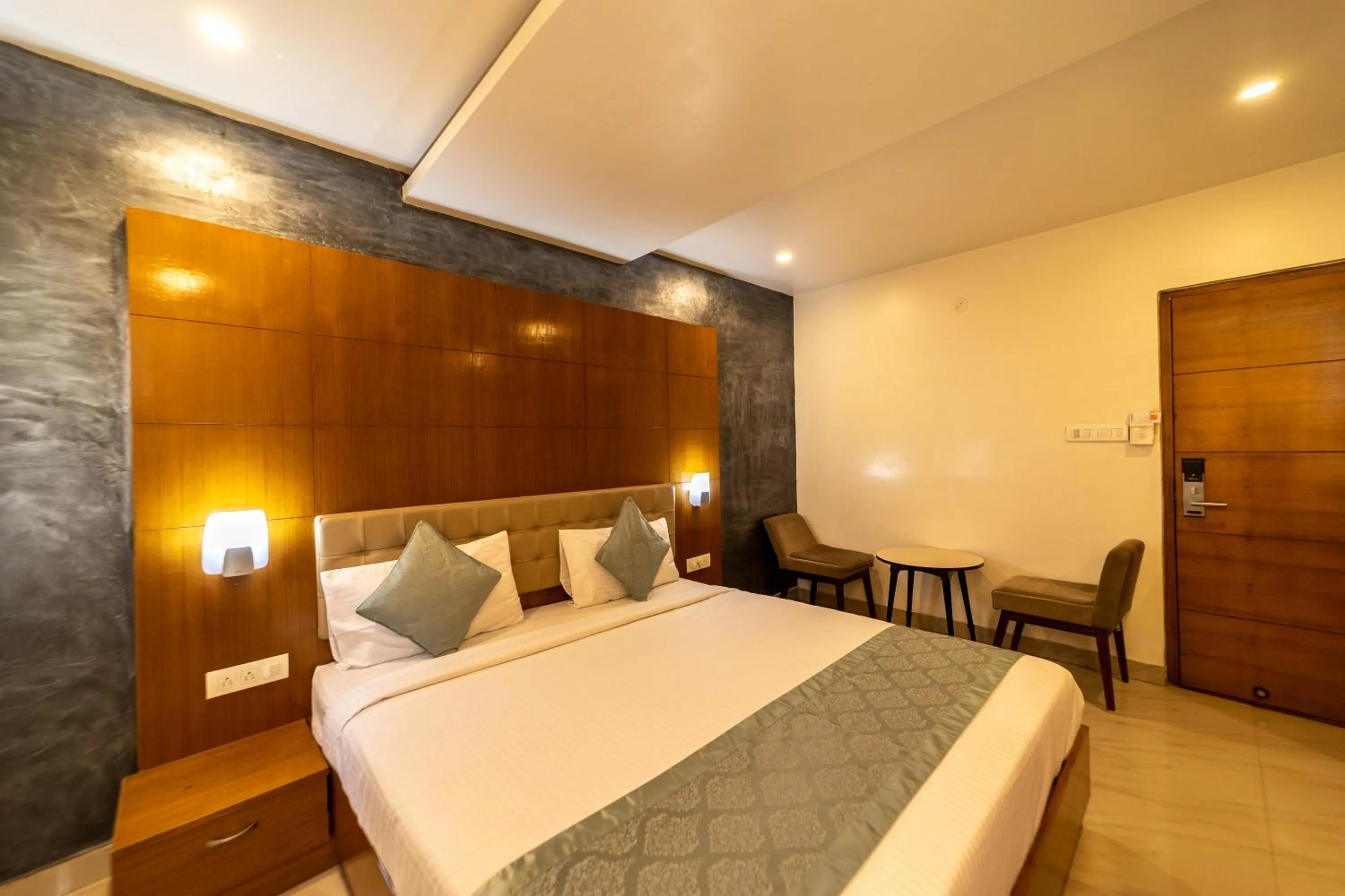 Bedroom, Bed in Tetrad Hotels - International Airport Road Hebbal
