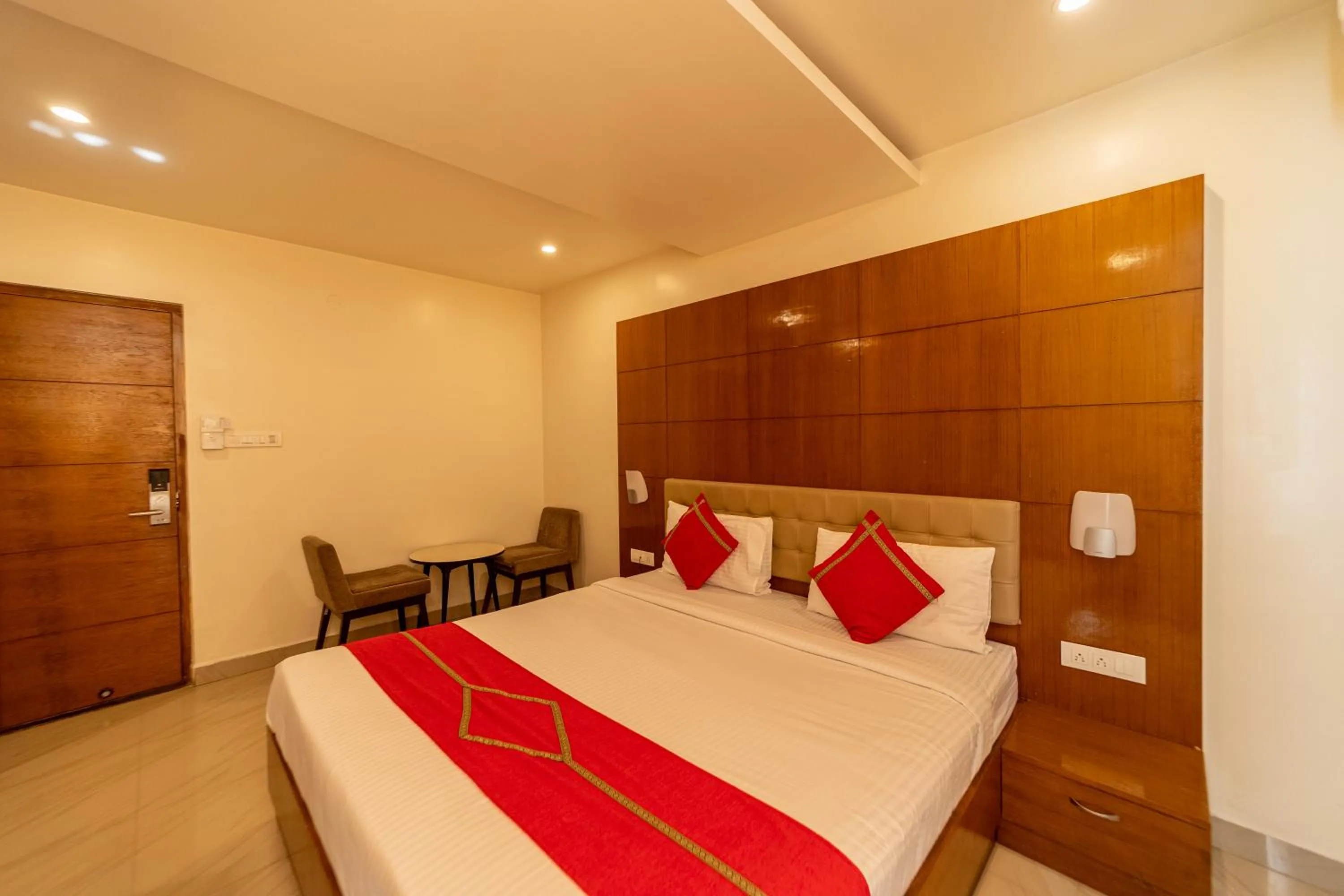 Photo of the whole room, Bed in Tetrad Hotels - International Airport Road Hebbal