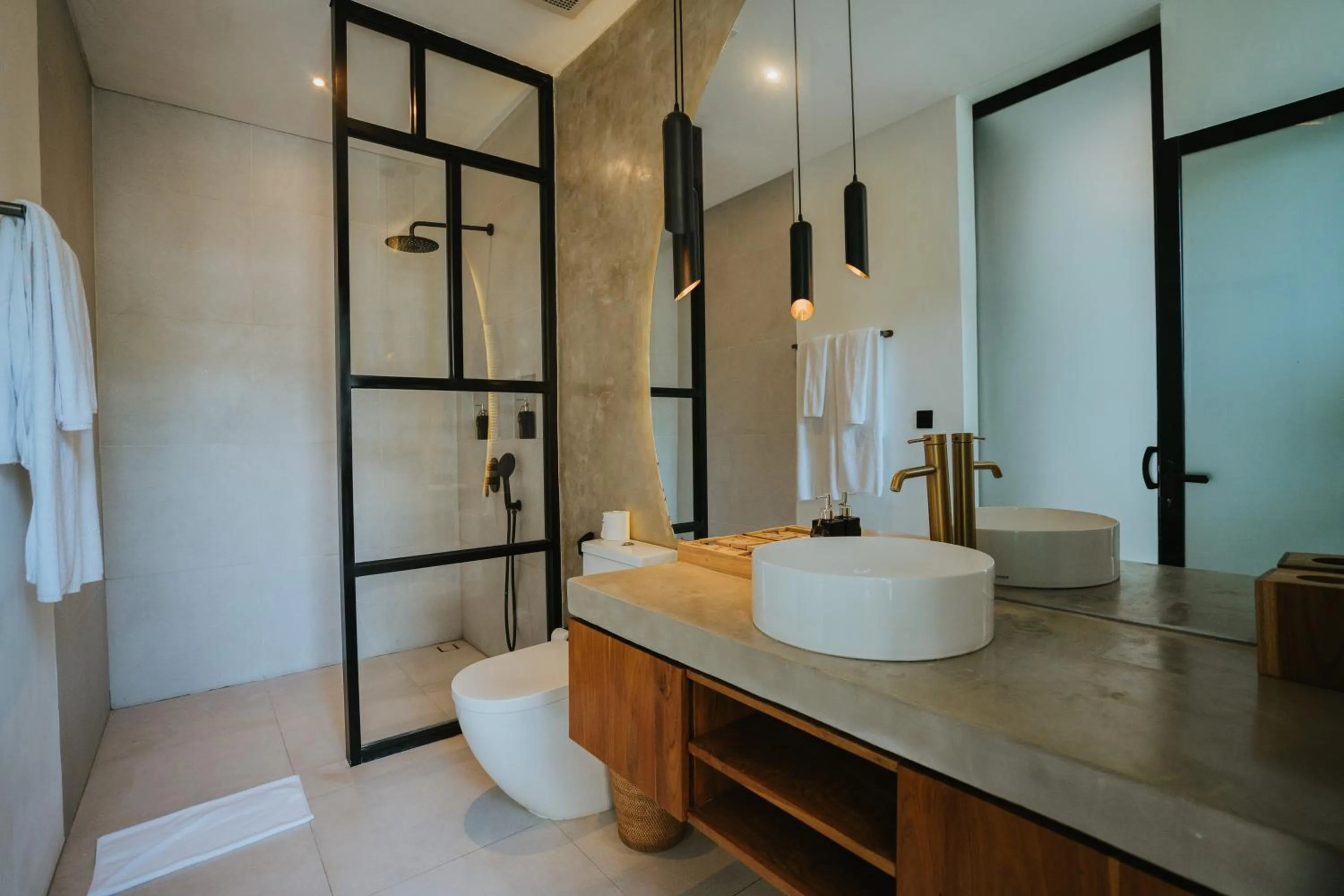 Shower in Baliwood Residence Villas by BREIG