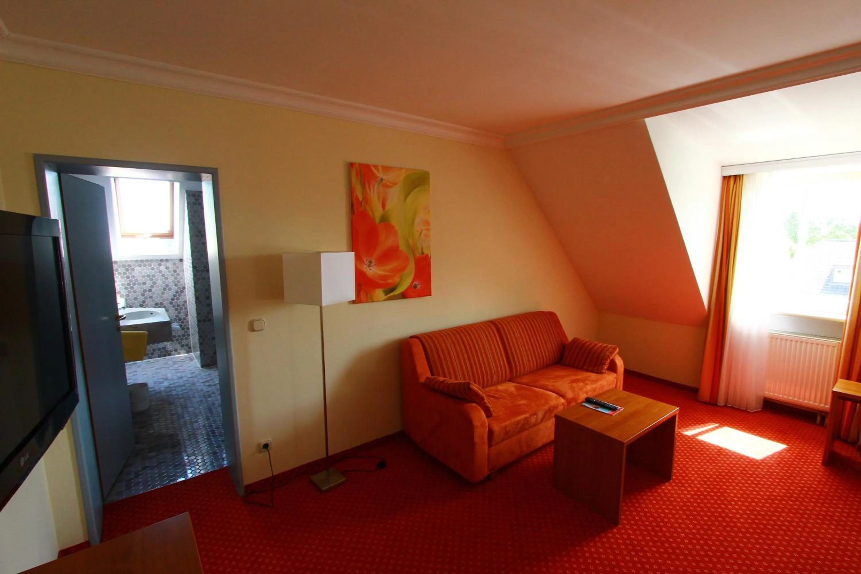 Seating area in Abasto Hotel Eichenau