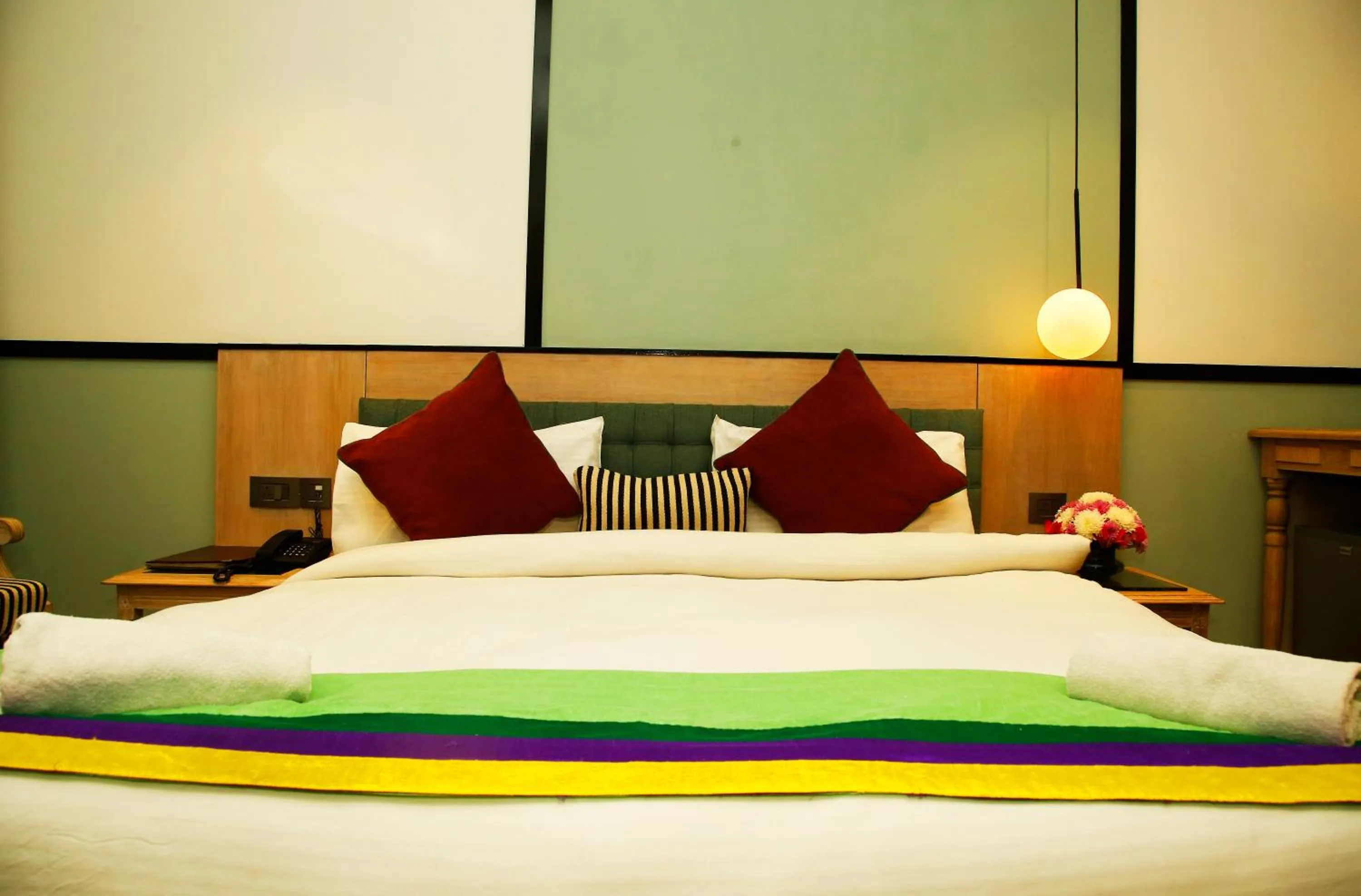 Bed in AMARA HOTEL