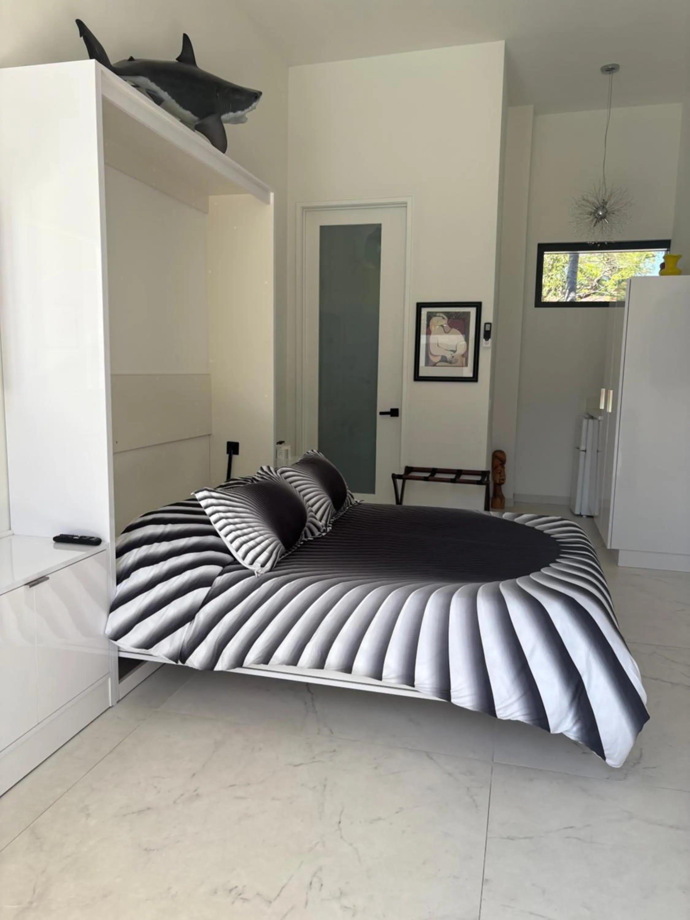 Bed in Men only clothing option guesthouse near Wilton Manors