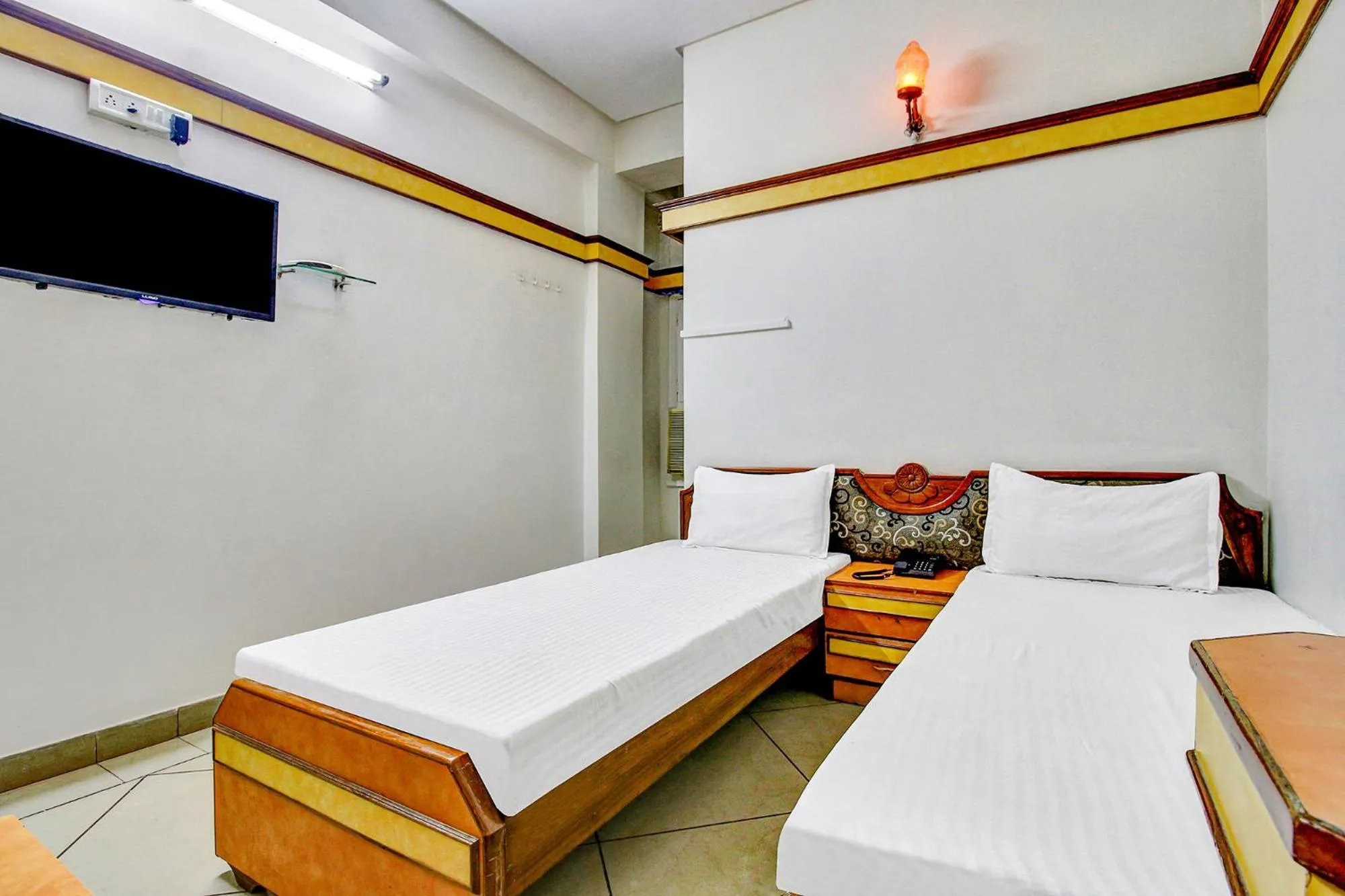 Bed in FabHotel Prime Manjeet