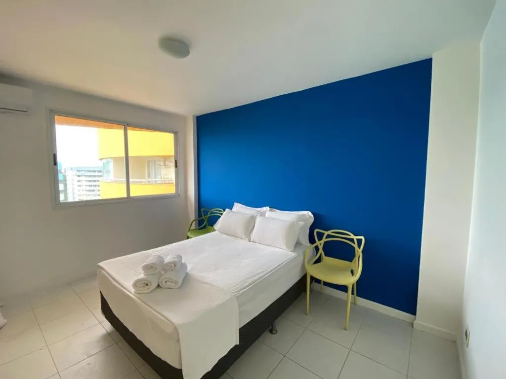 Bed in Mountain, lake and pool view apartment