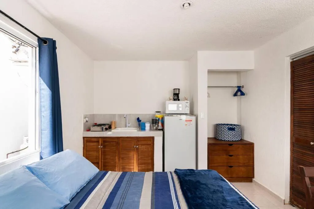 Kitchen or kitchenette, Bed in Micro Studio perfect for backpackers, couples, 3 min drive to Playa El Nino