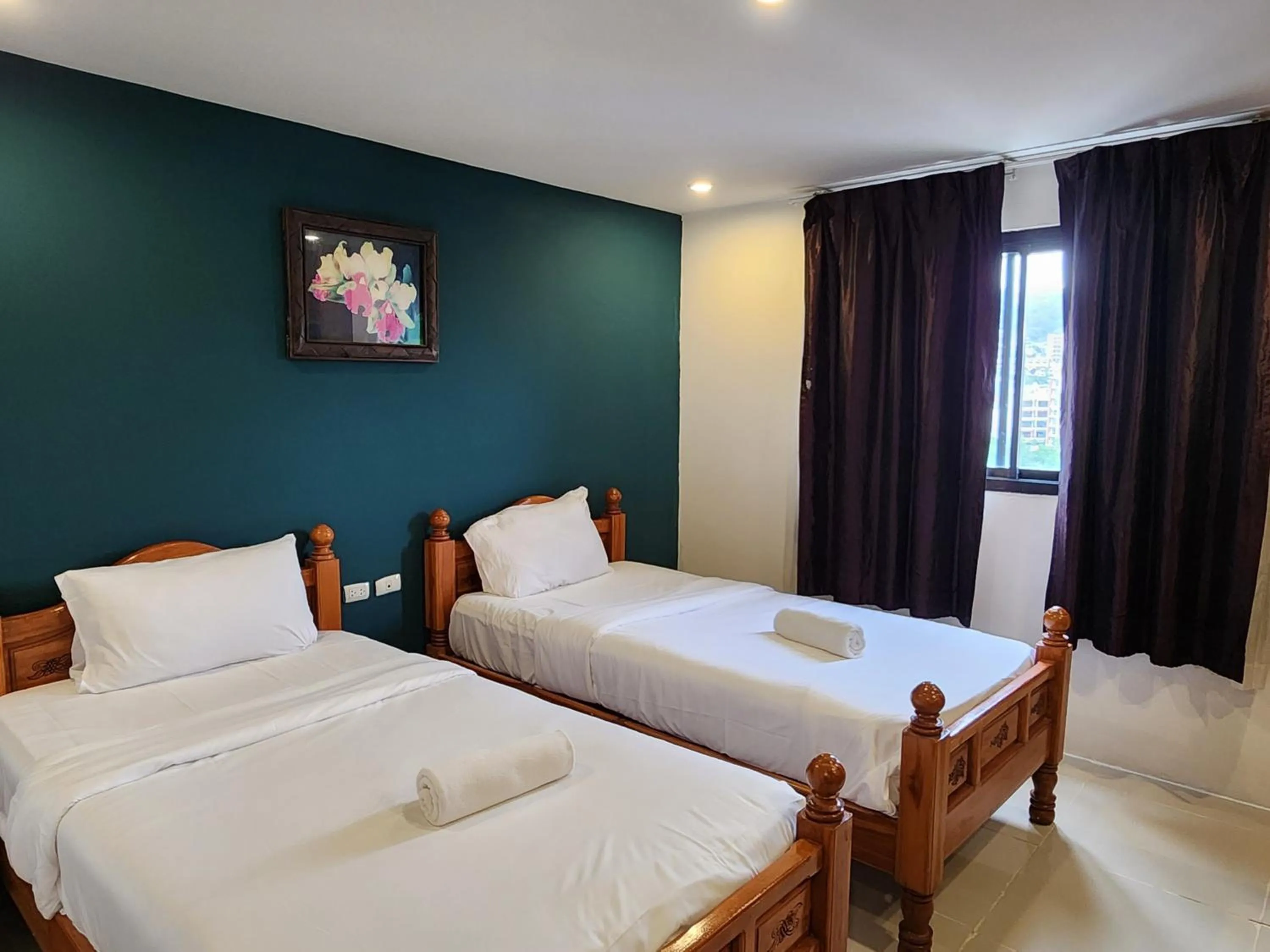 Bed in Patong Dynasty Royal Hotel