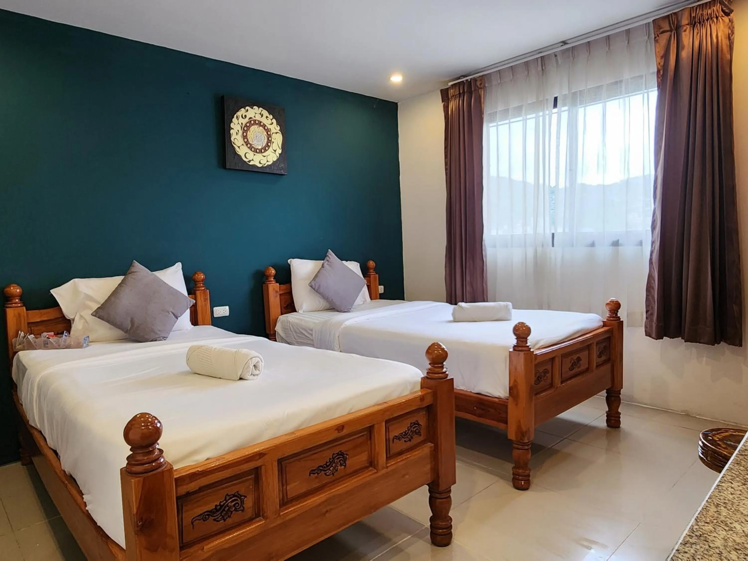 Bed in Patong Dynasty Royal Hotel