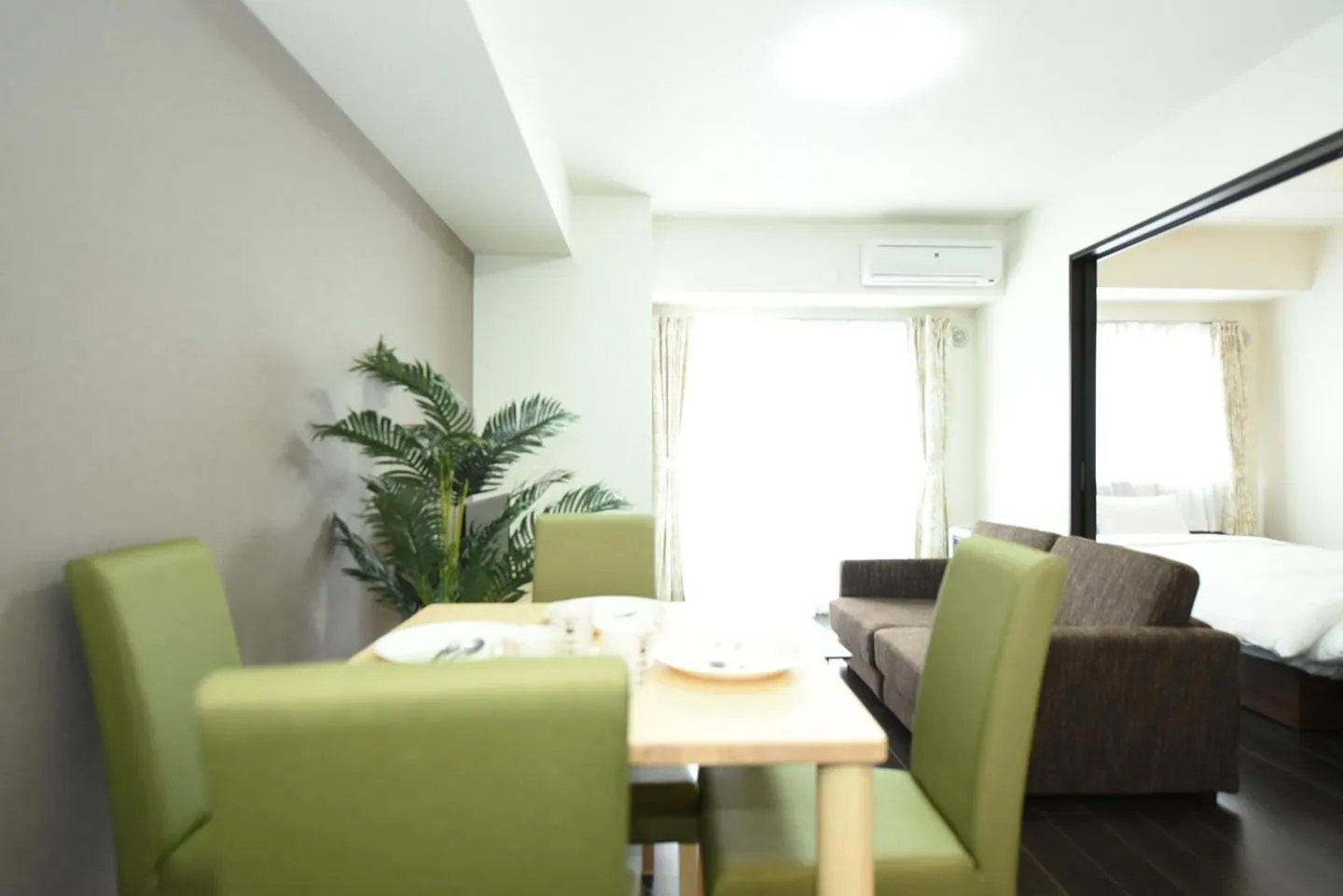 Dining area, Bed in Sun Court Hongodori Garden Hills