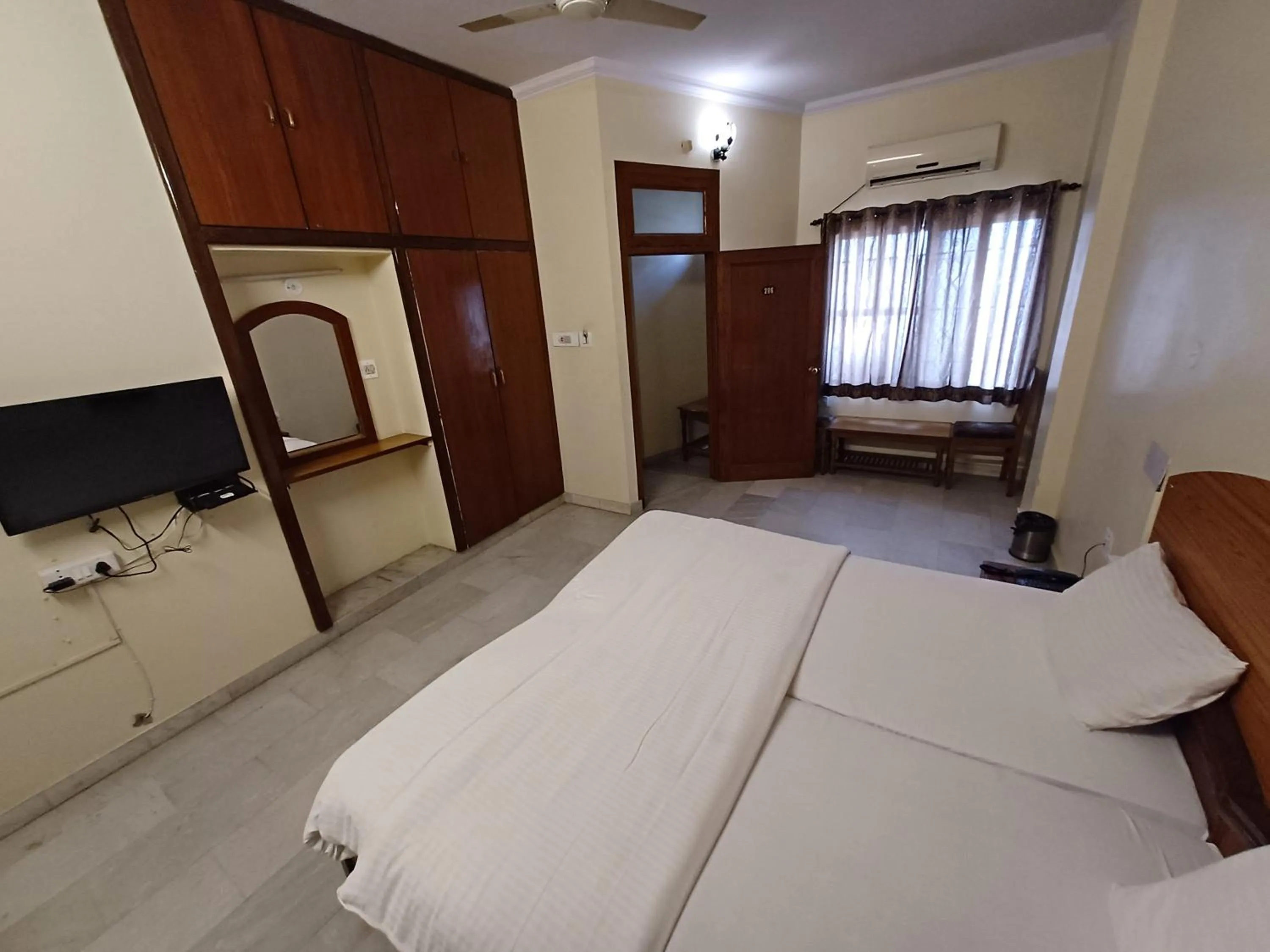 Photo of the whole room, Bed in Hotel Raghav Palace 1 km Jaipur Junction & Bus Stand Sindhi Camp