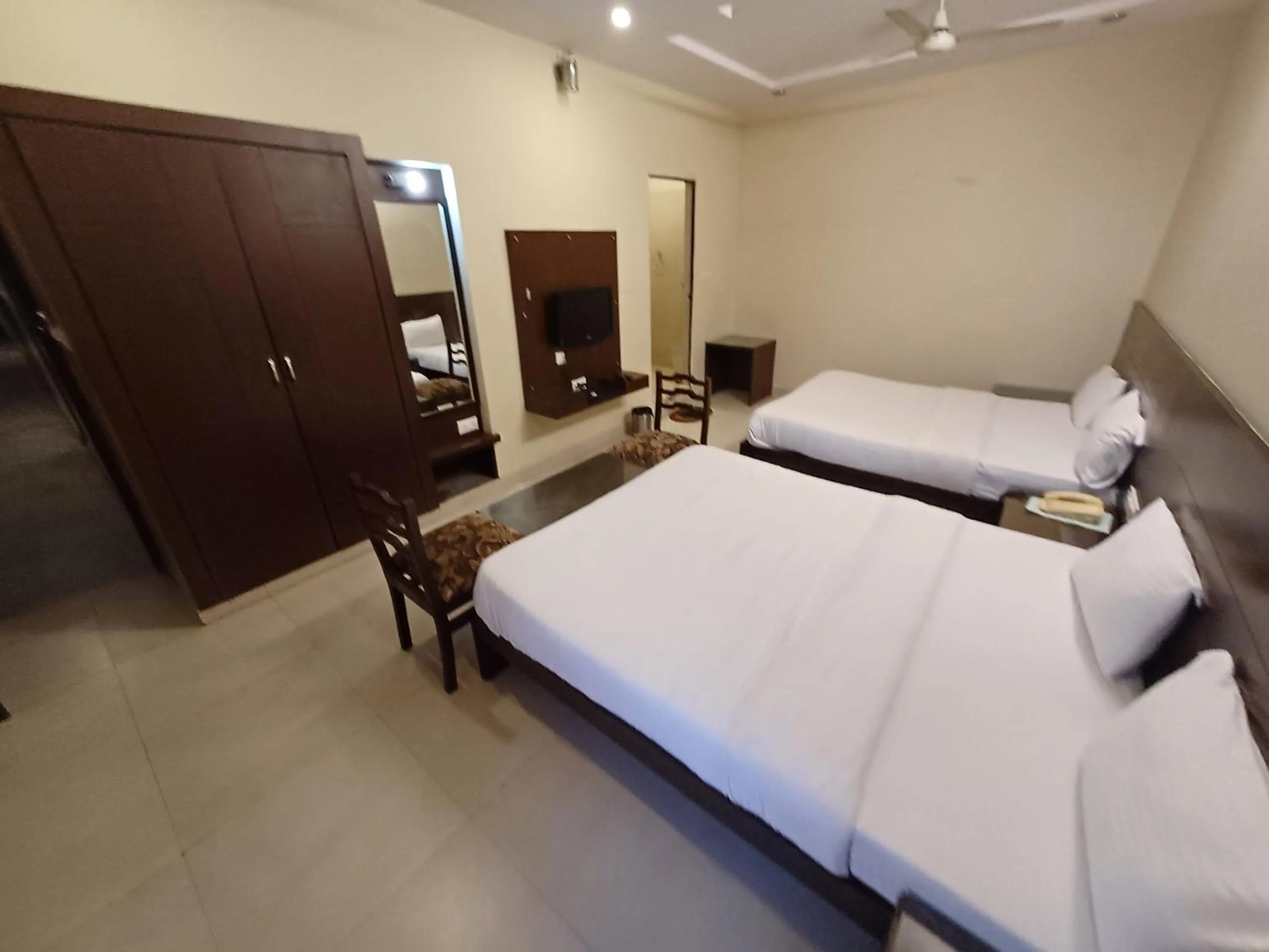 Photo of the whole room, Bed in Hotel Raghav Palace 1 km Jaipur Junction & Bus Stand Sindhi Camp