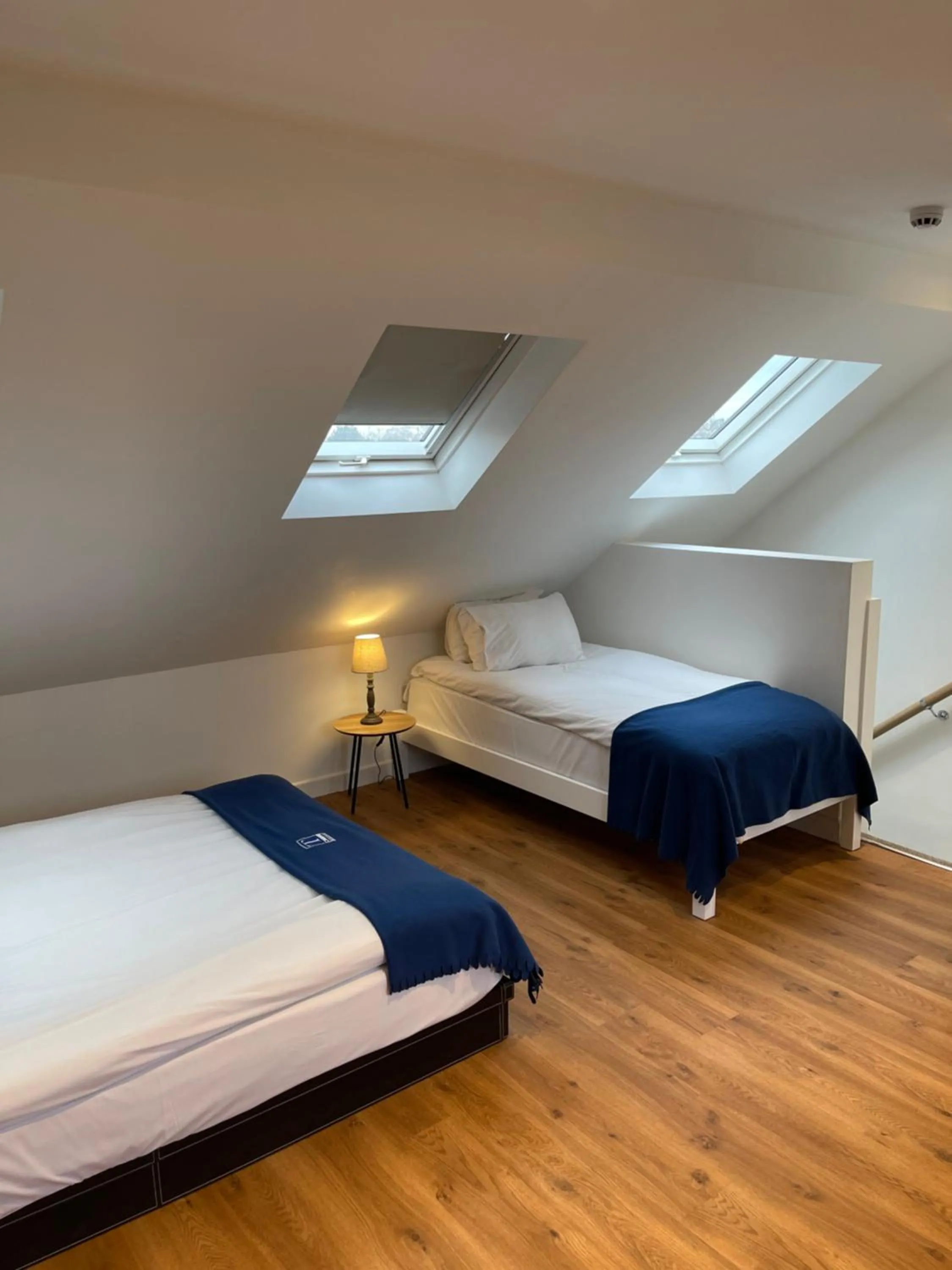 Bed in Cambridge Studios and Suites by Tas Accommodations
