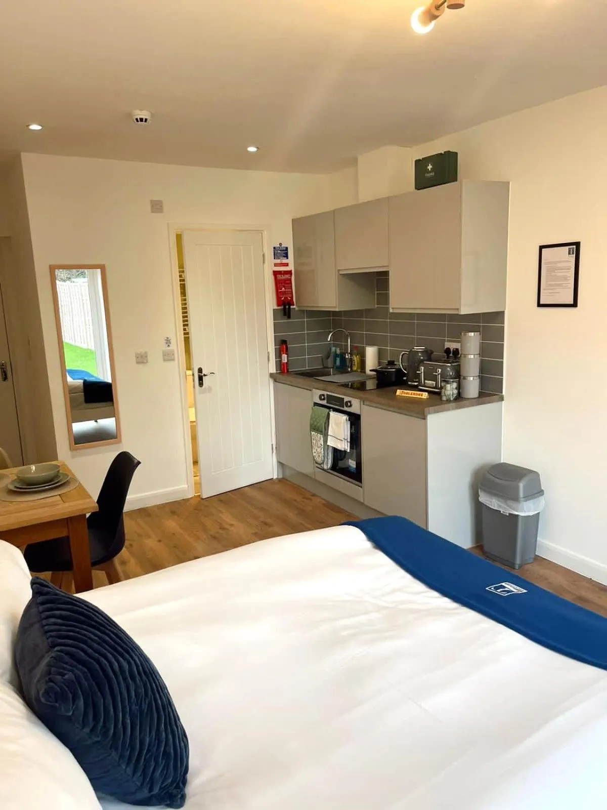 Bed in Cambridge Studios and Suites by Tas Accommodations