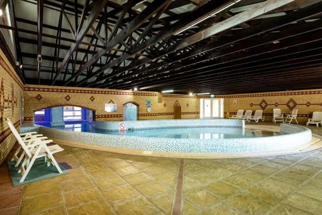 Swimming pool in Coghurst Hall Holiday Home Sleeps 6, 2 bedrooms