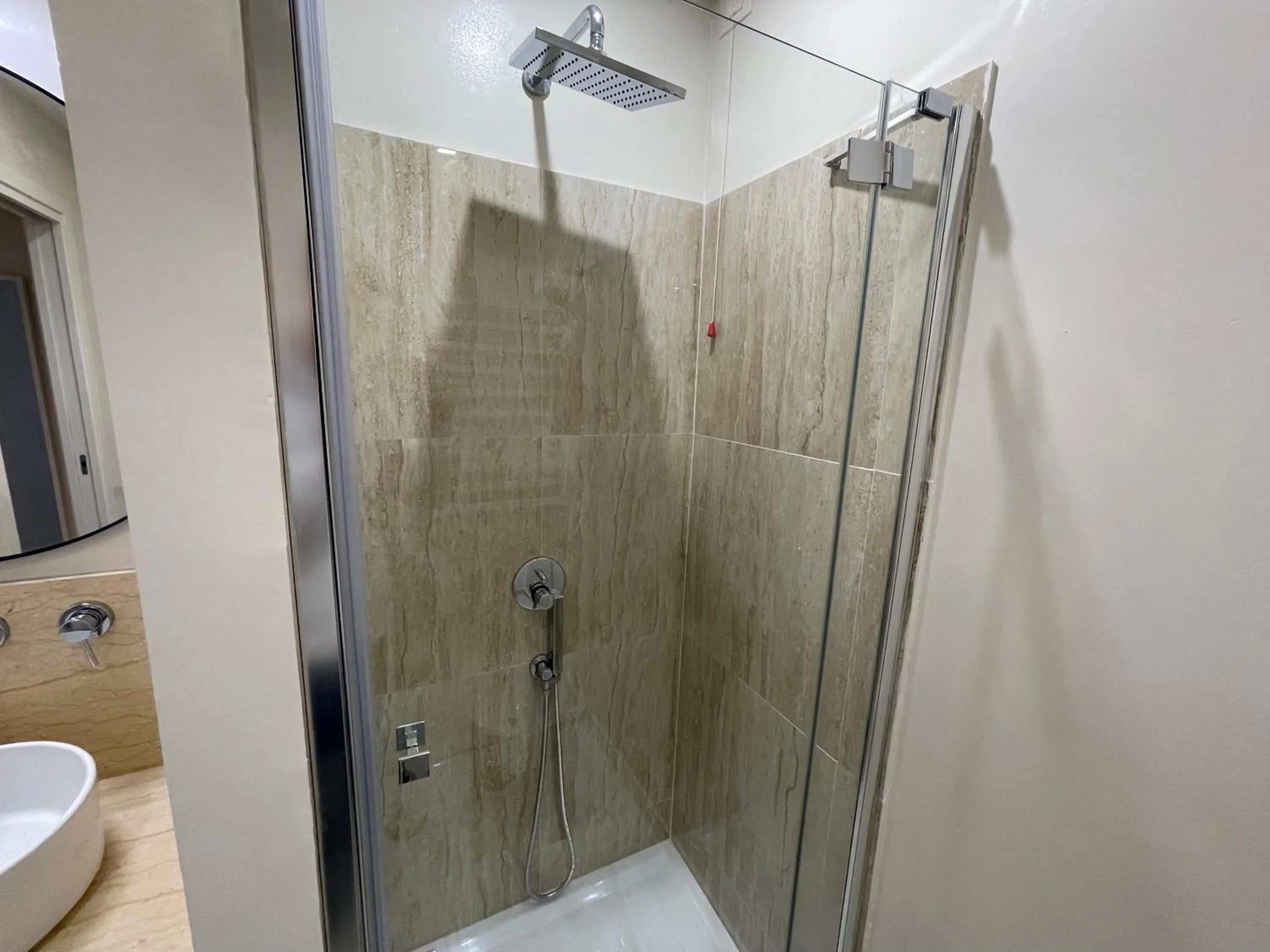 Shower in Quintus Luxury Suites