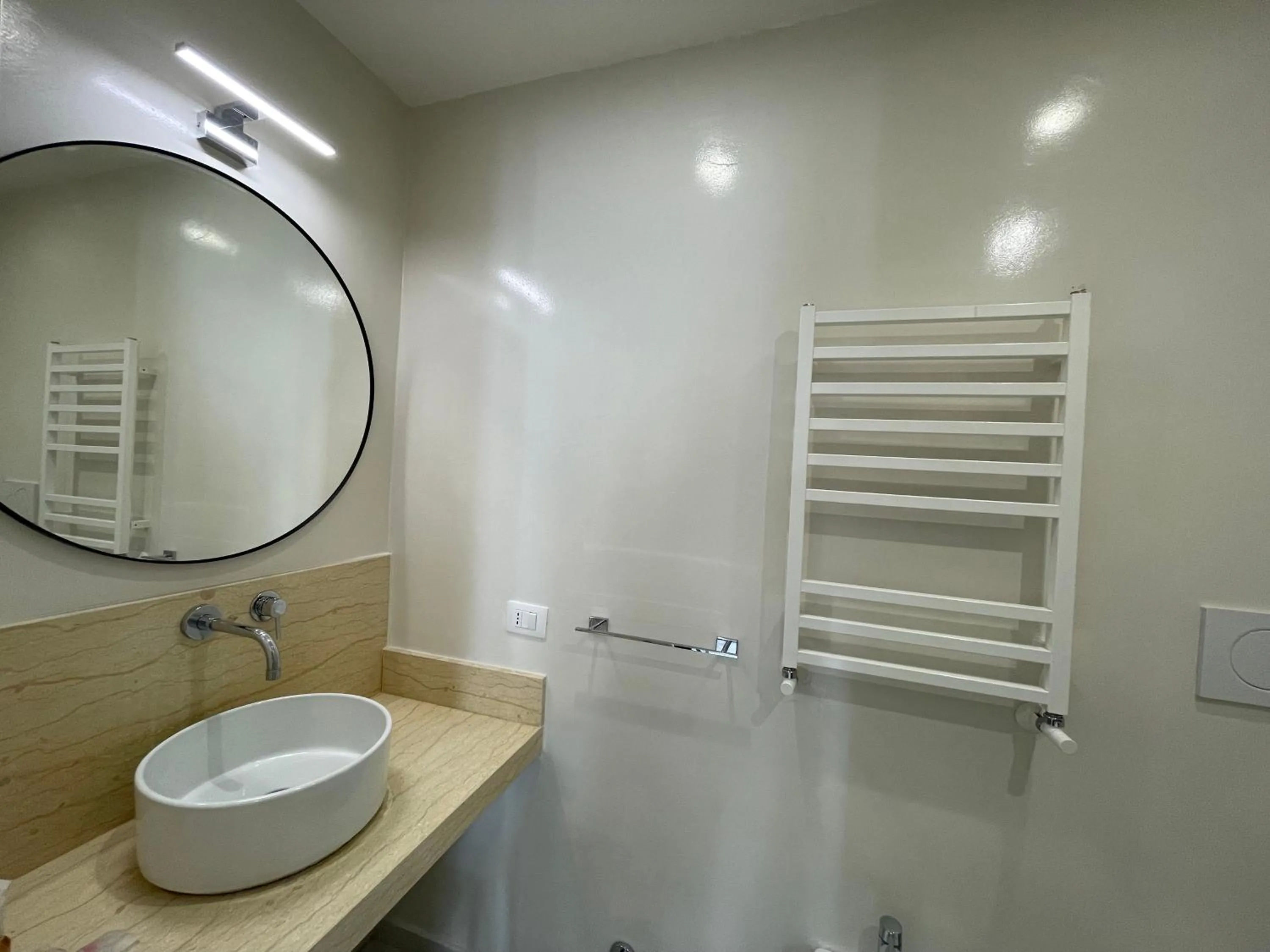 Toilet in Quintus Luxury Suites