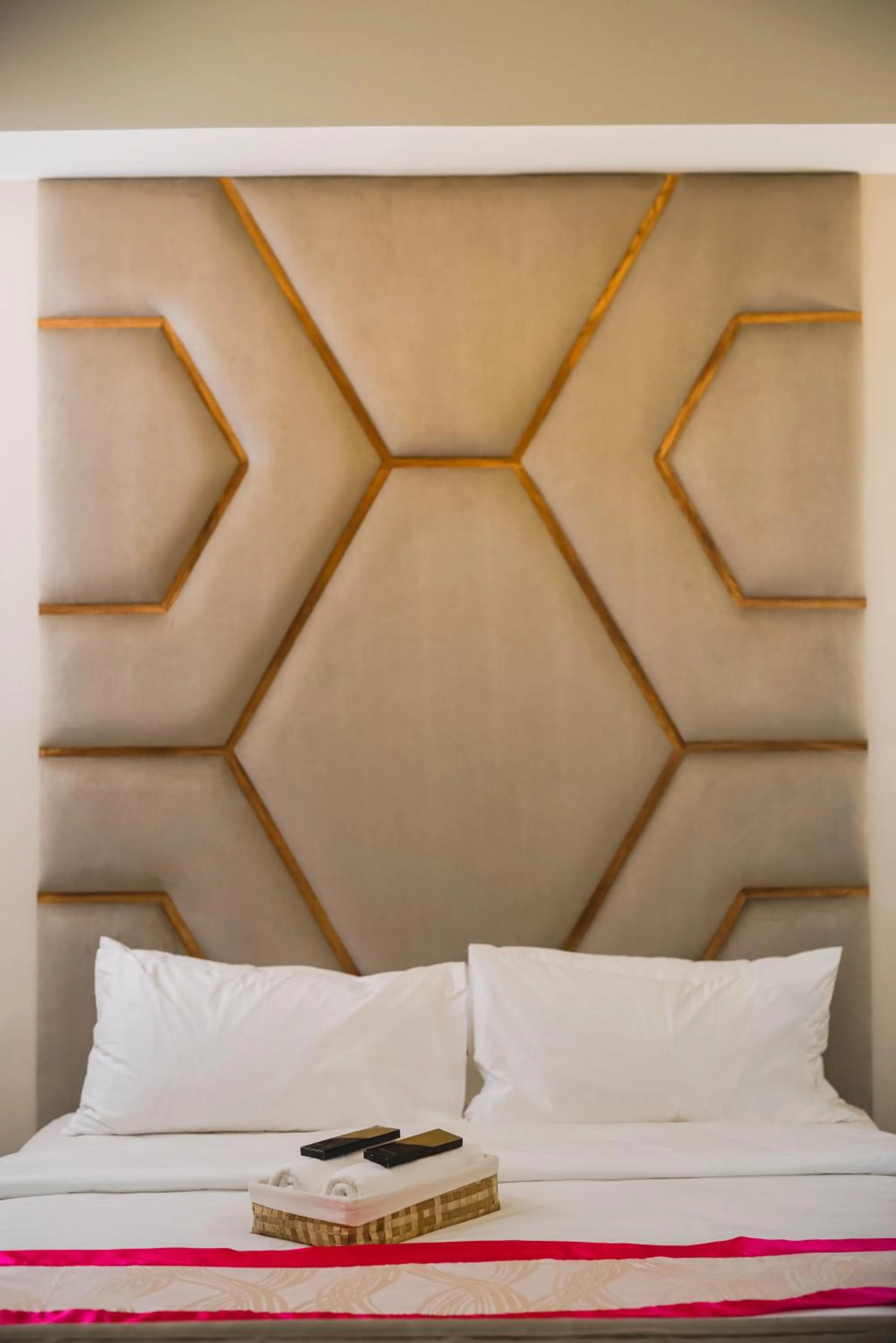 Bed in Monica Midtown Suites