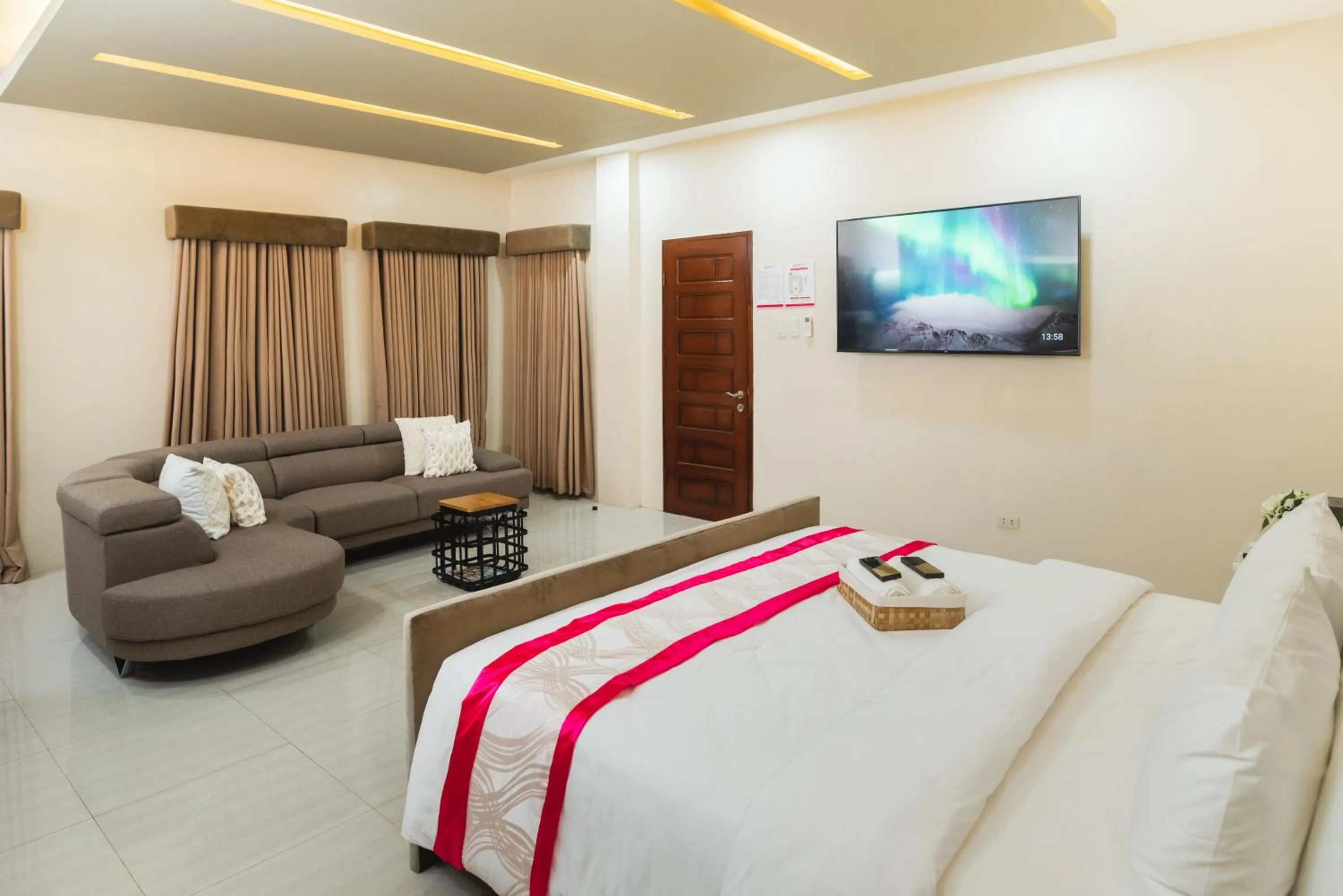 Bed in Monica Midtown Suites