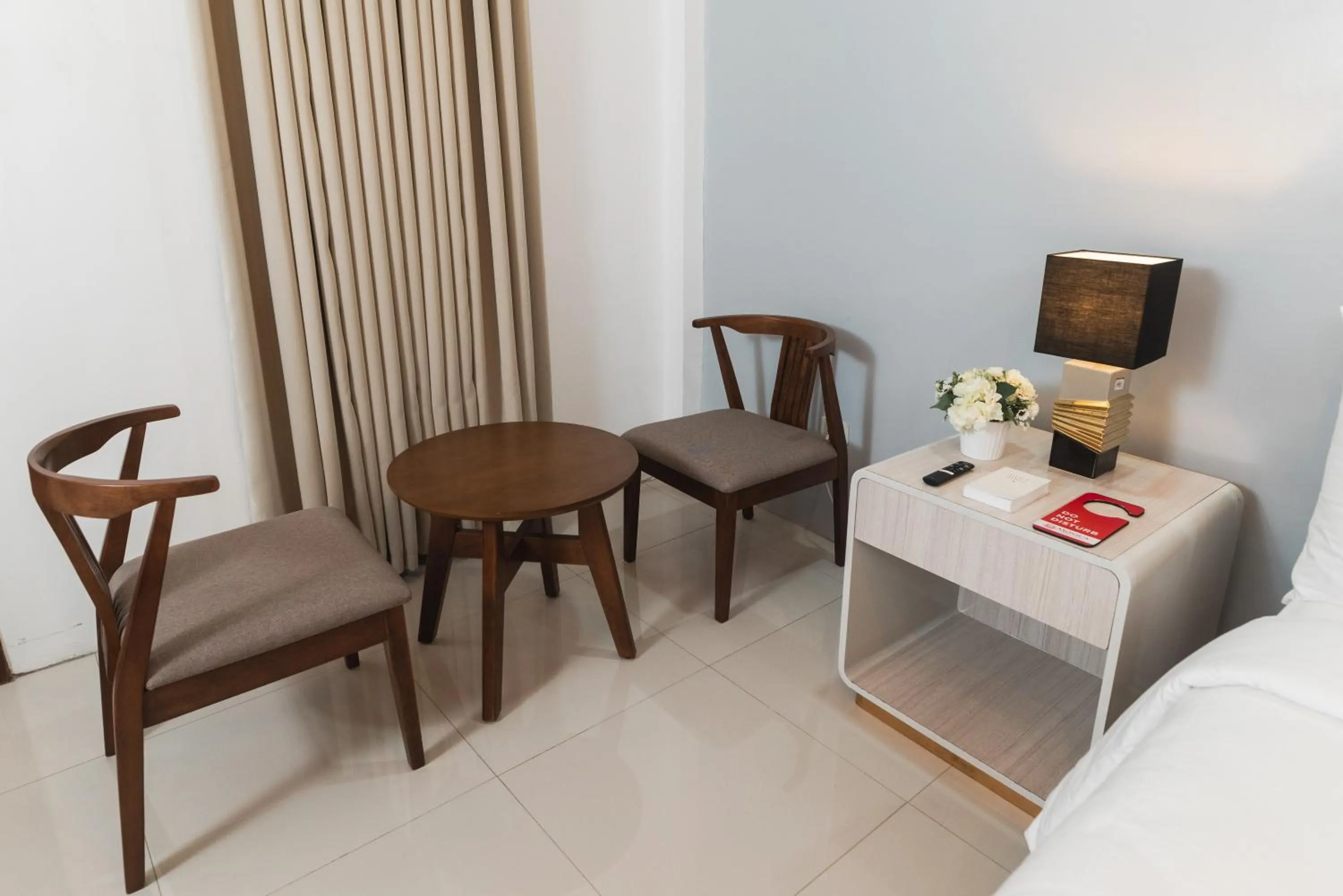 Bed in Monica Midtown Suites