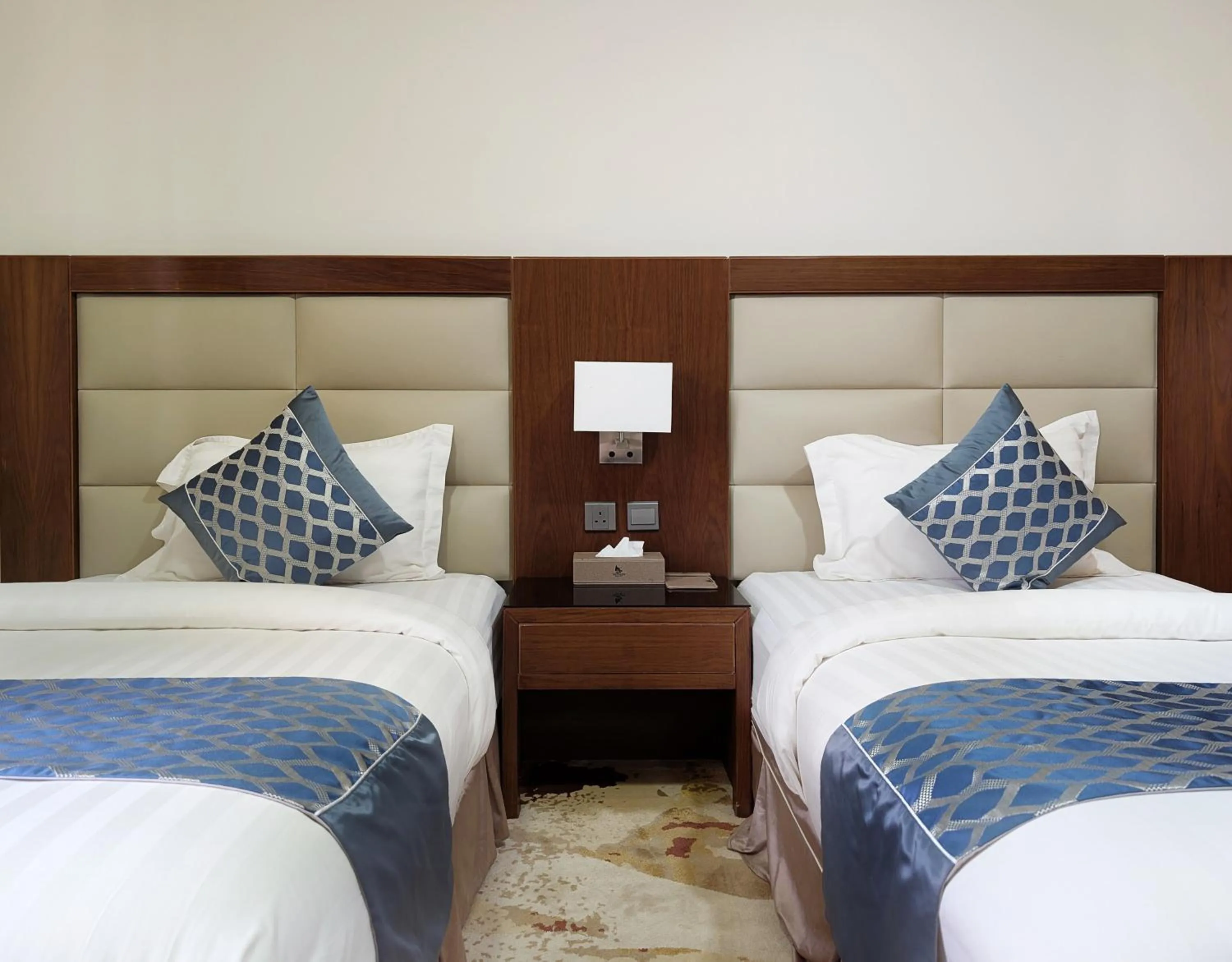 Bed in Delta Hotel Suites