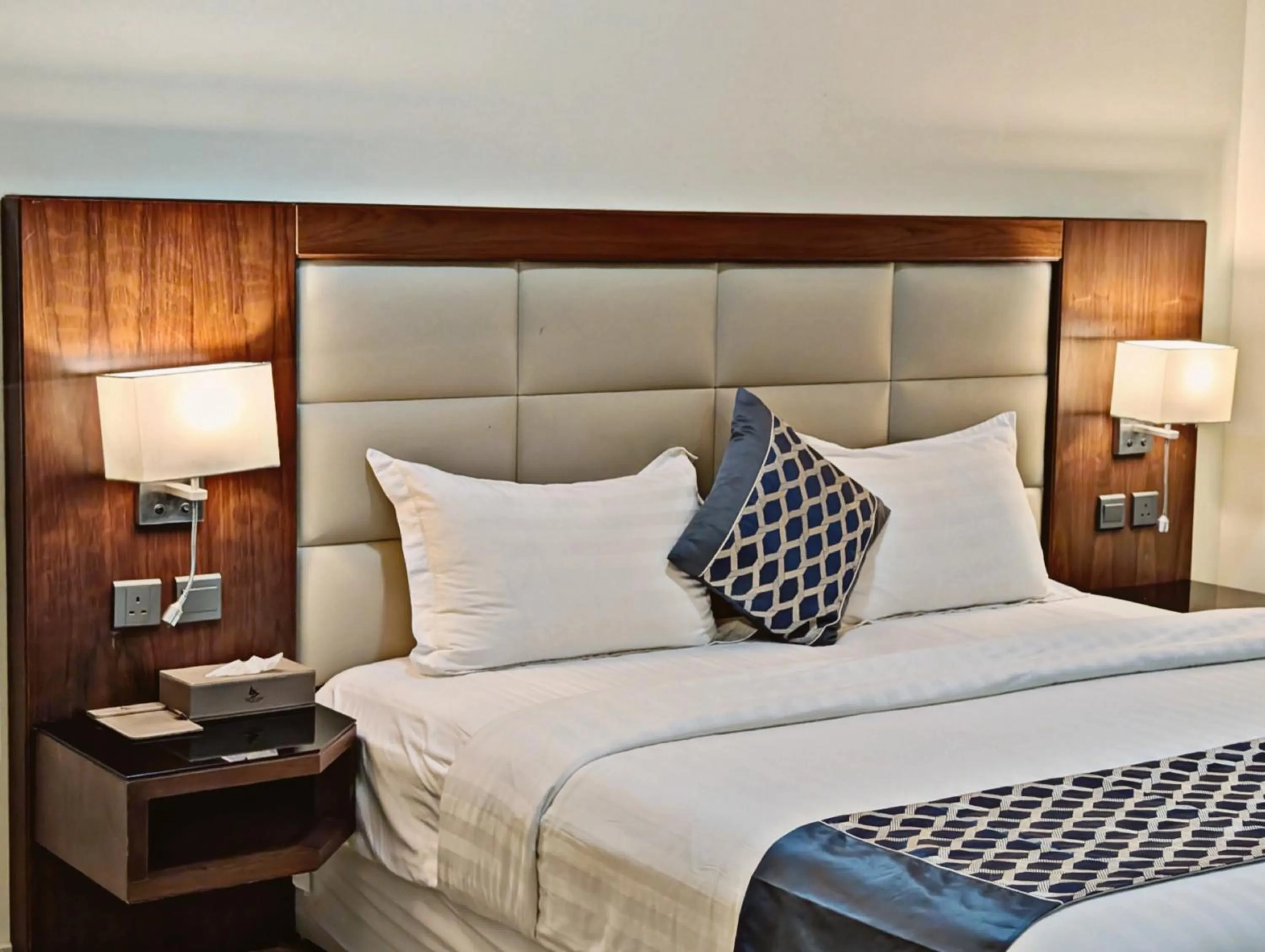 Bed in Delta Hotel Suites