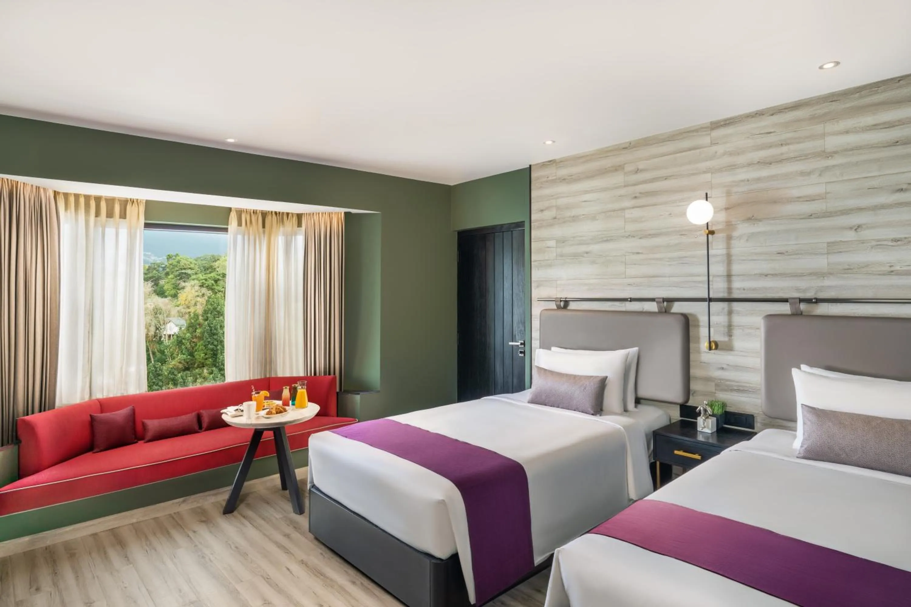 Bed in Vivanta Meghalaya Shillong