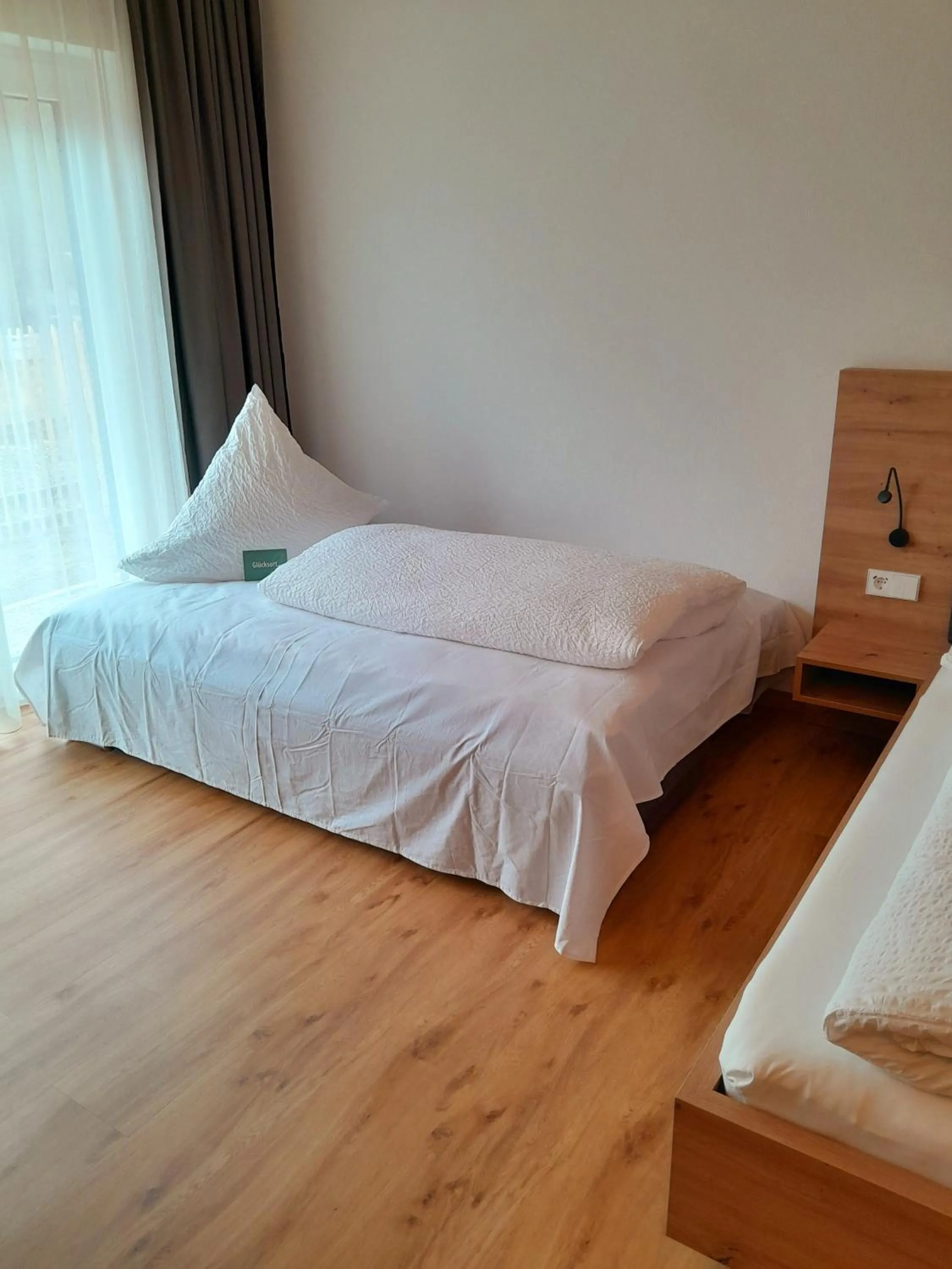 Bed in DAS GEORG Gästehaus in Epfendorf