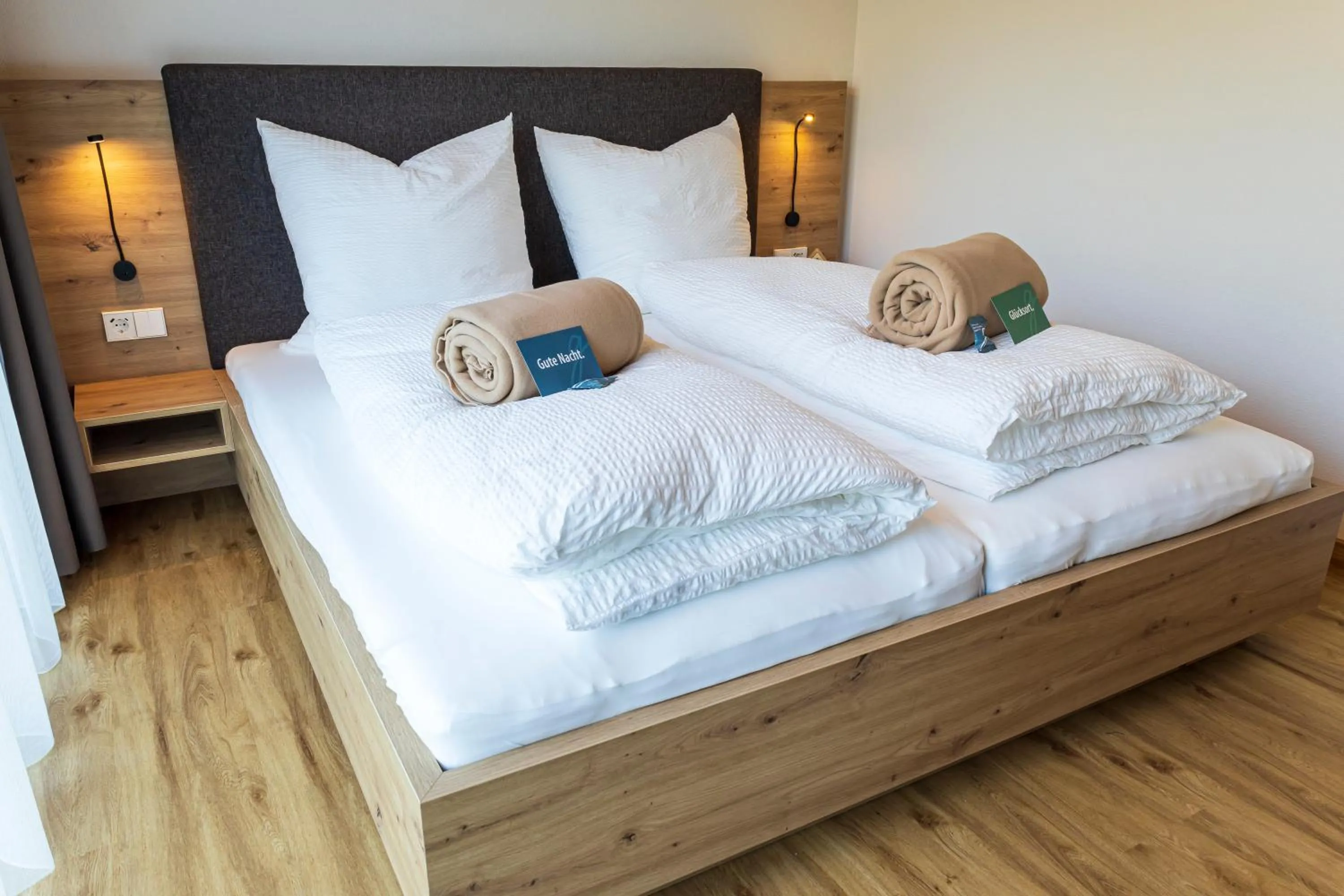 Bed in DAS GEORG Gästehaus in Epfendorf